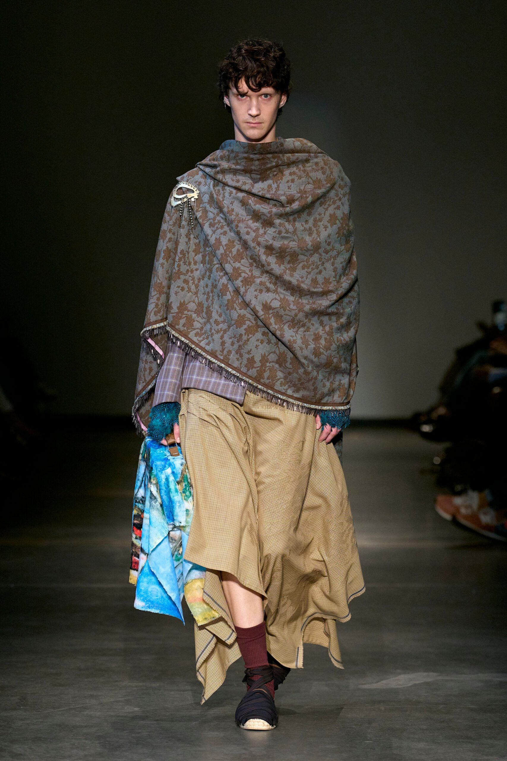 brown floral cape with purple shirt