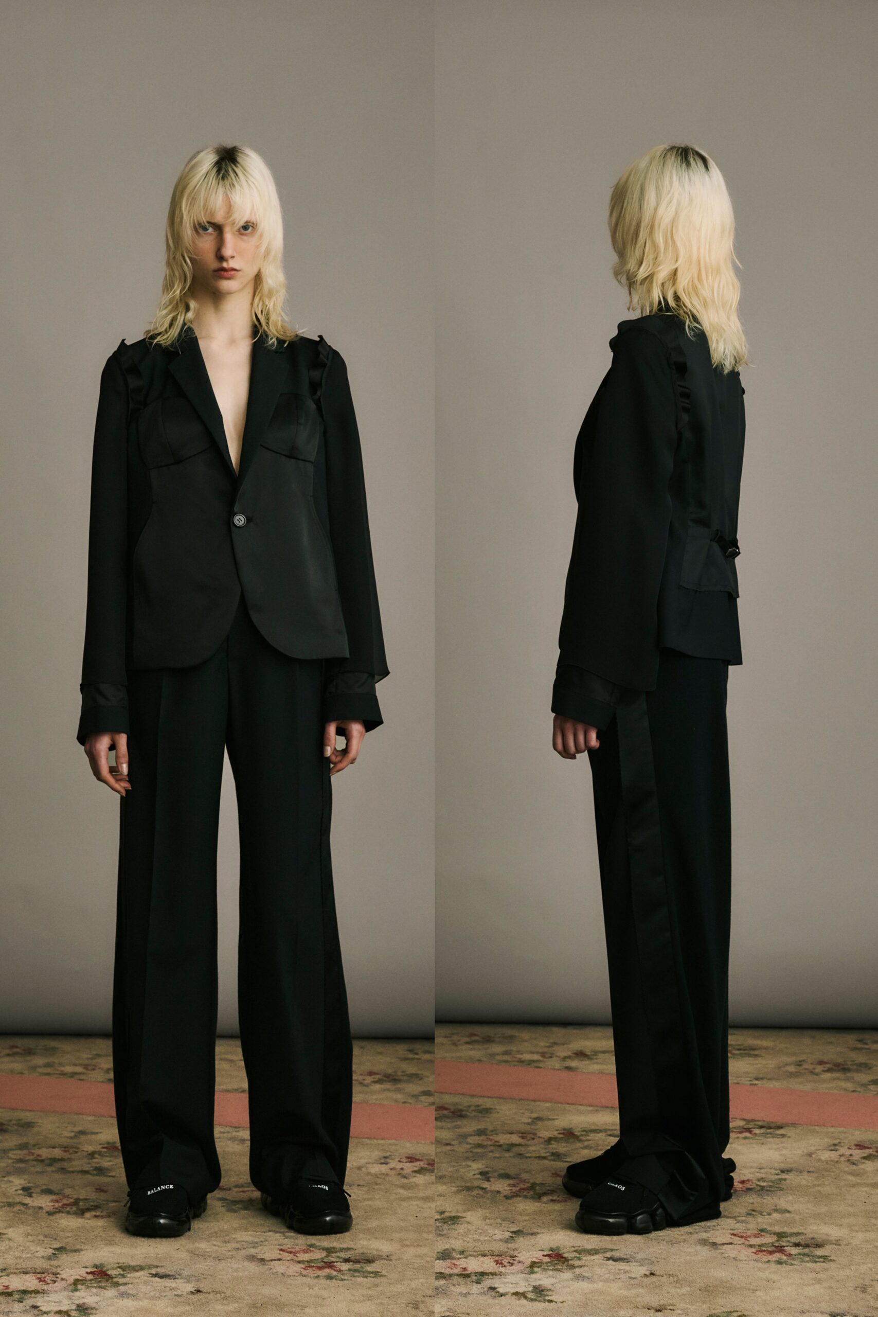 black structured blazer and relaxed pants