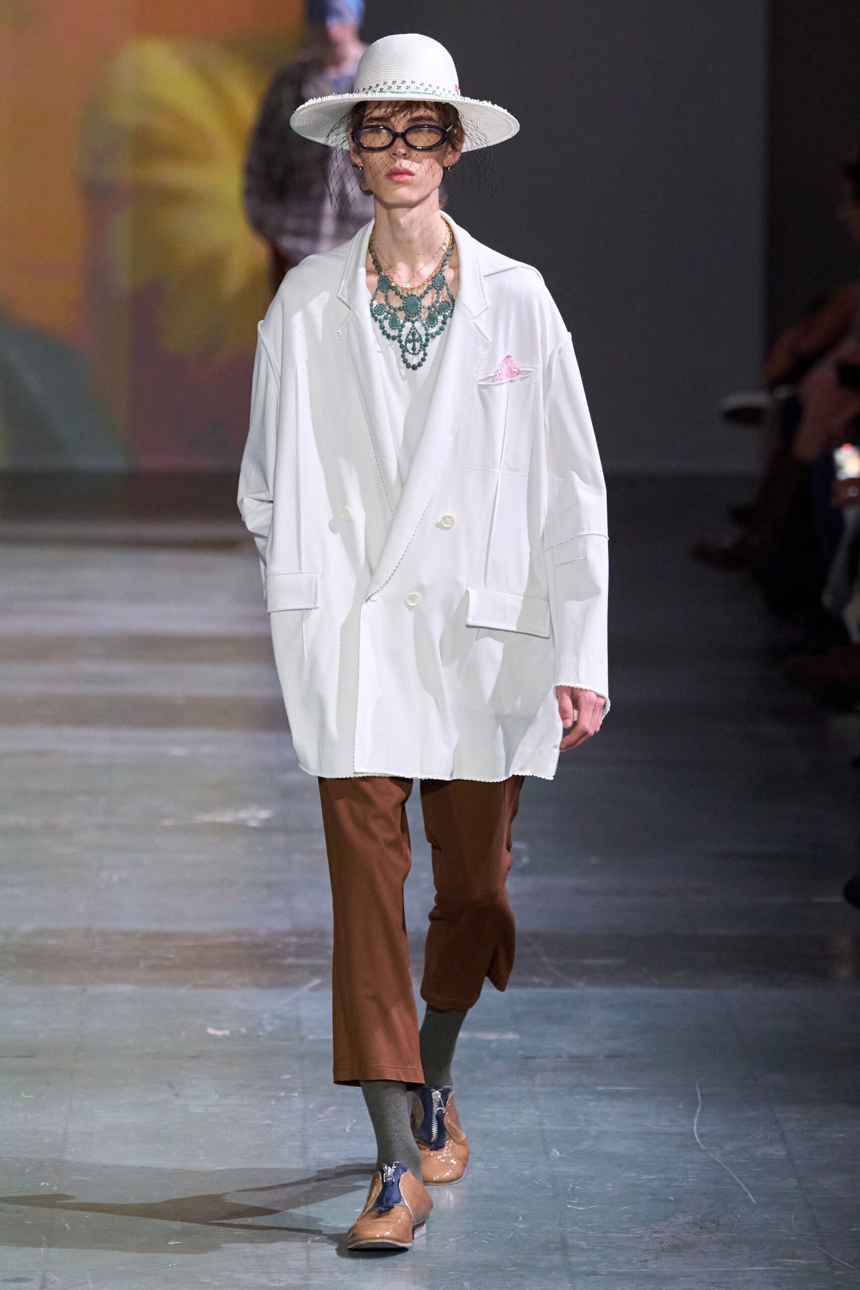 oversized white jacket with brown pants