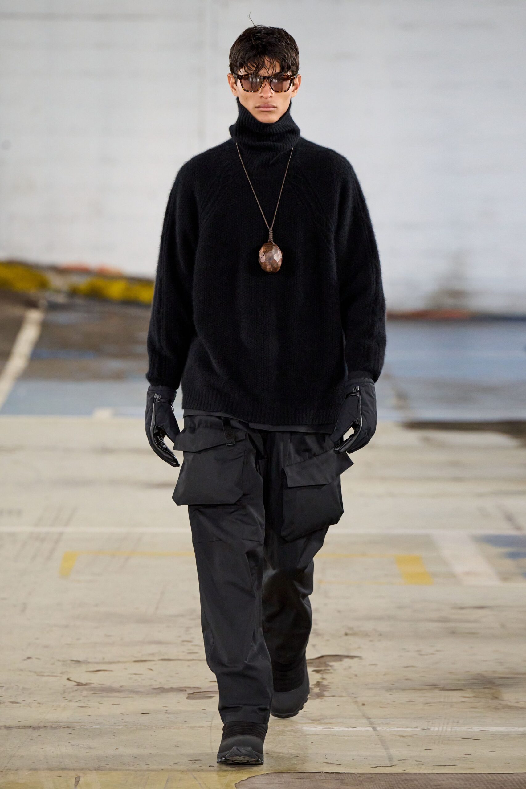 black relaxed sweater and cargo pants