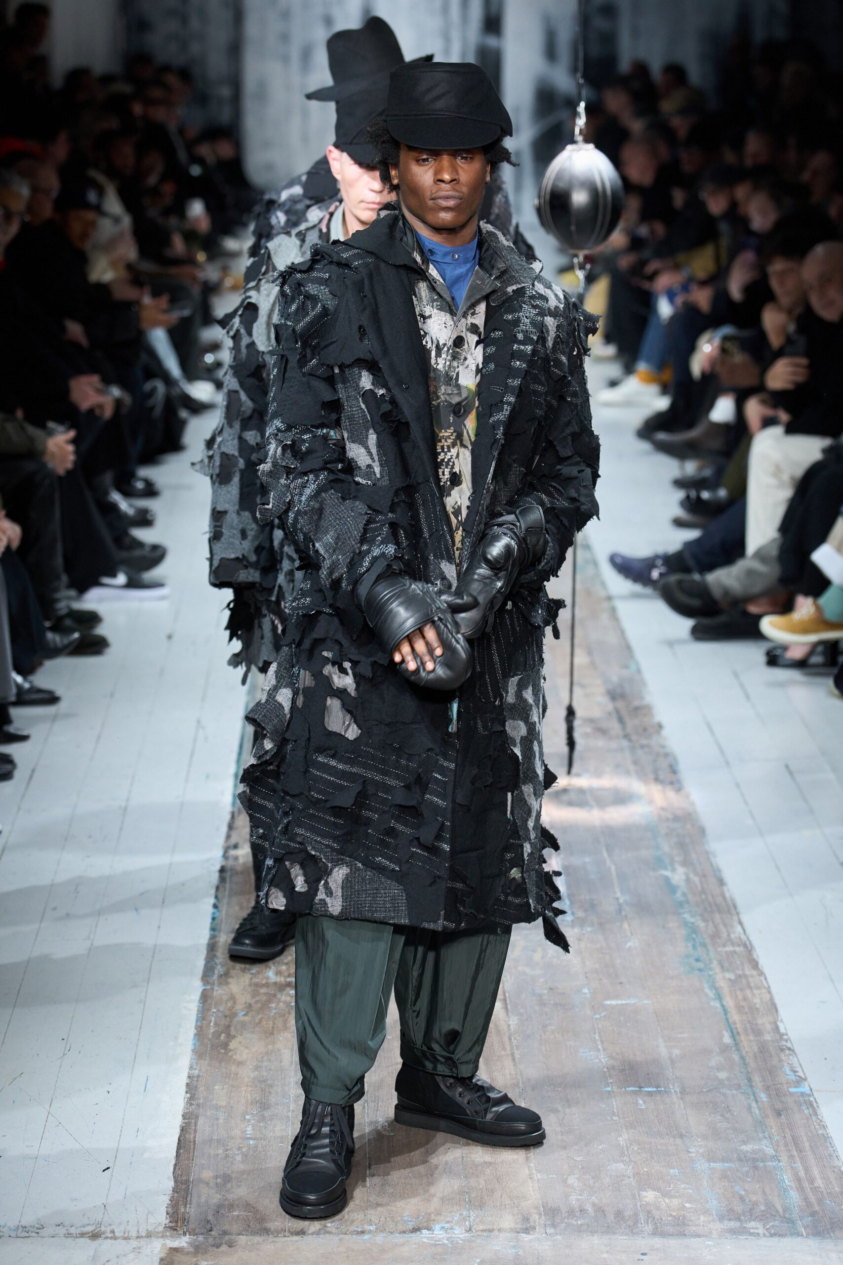 black layered coat with gloves