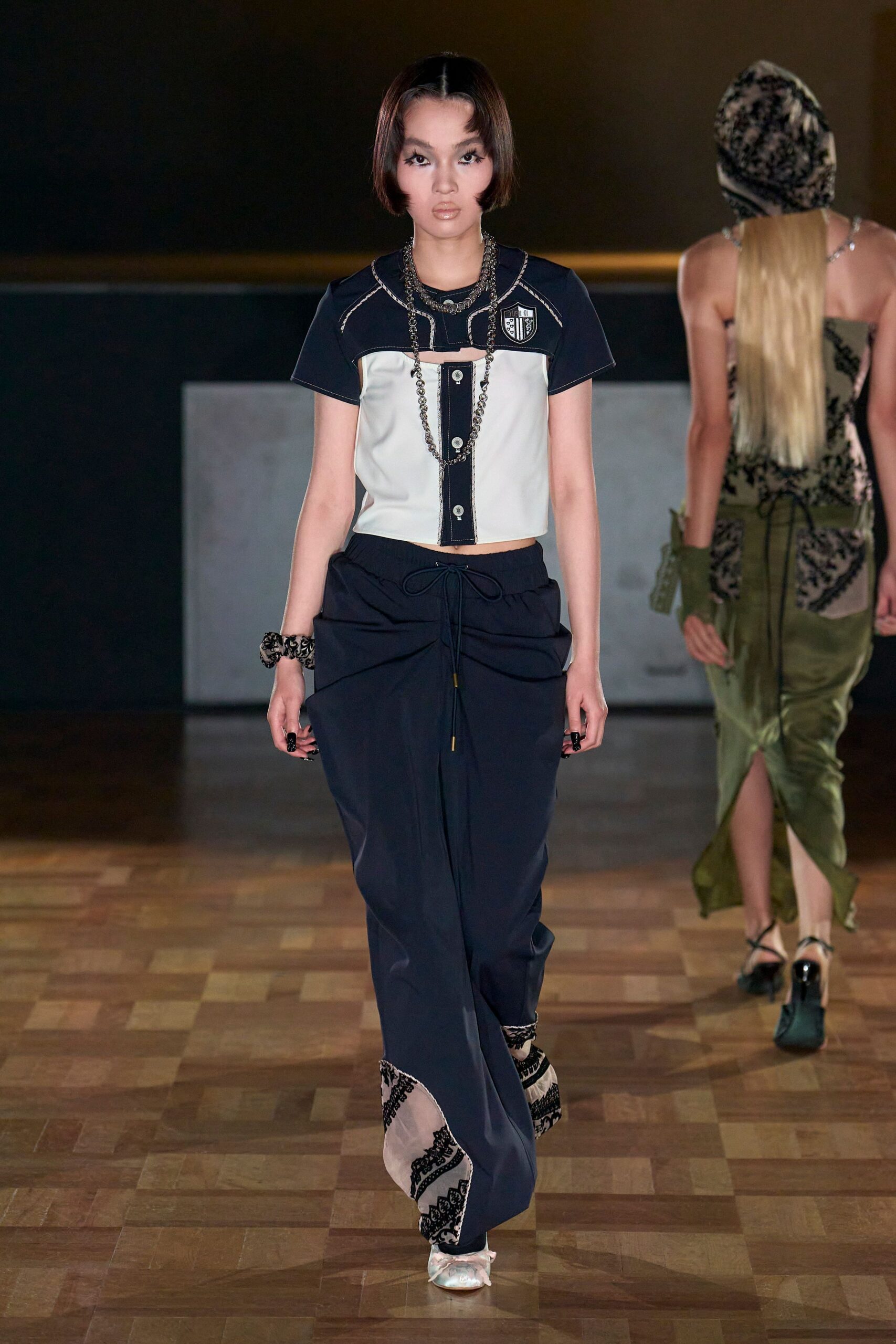 white short-sleeve collared fitted color-blocked top