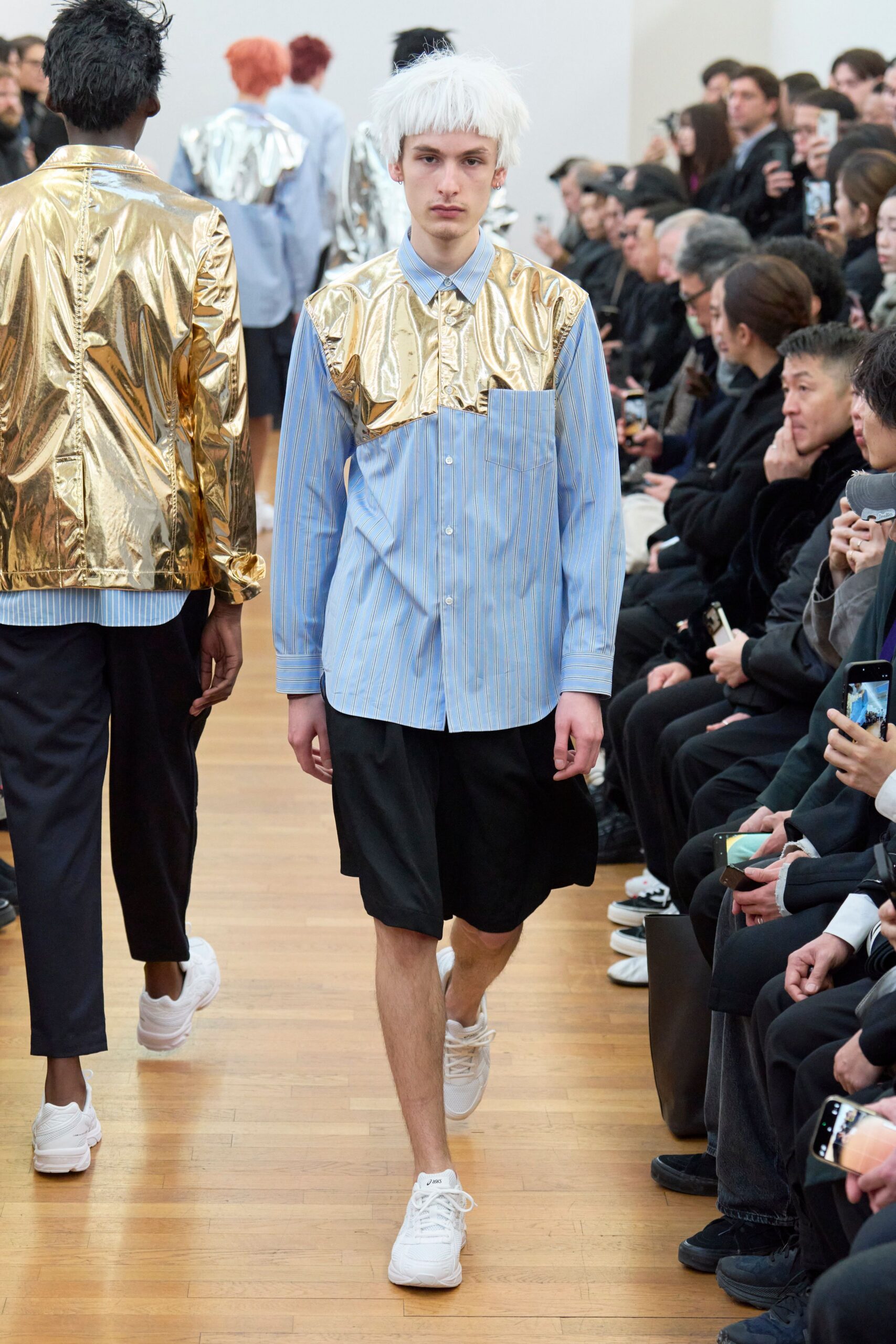 blue and gold relaxed shirt with black shorts