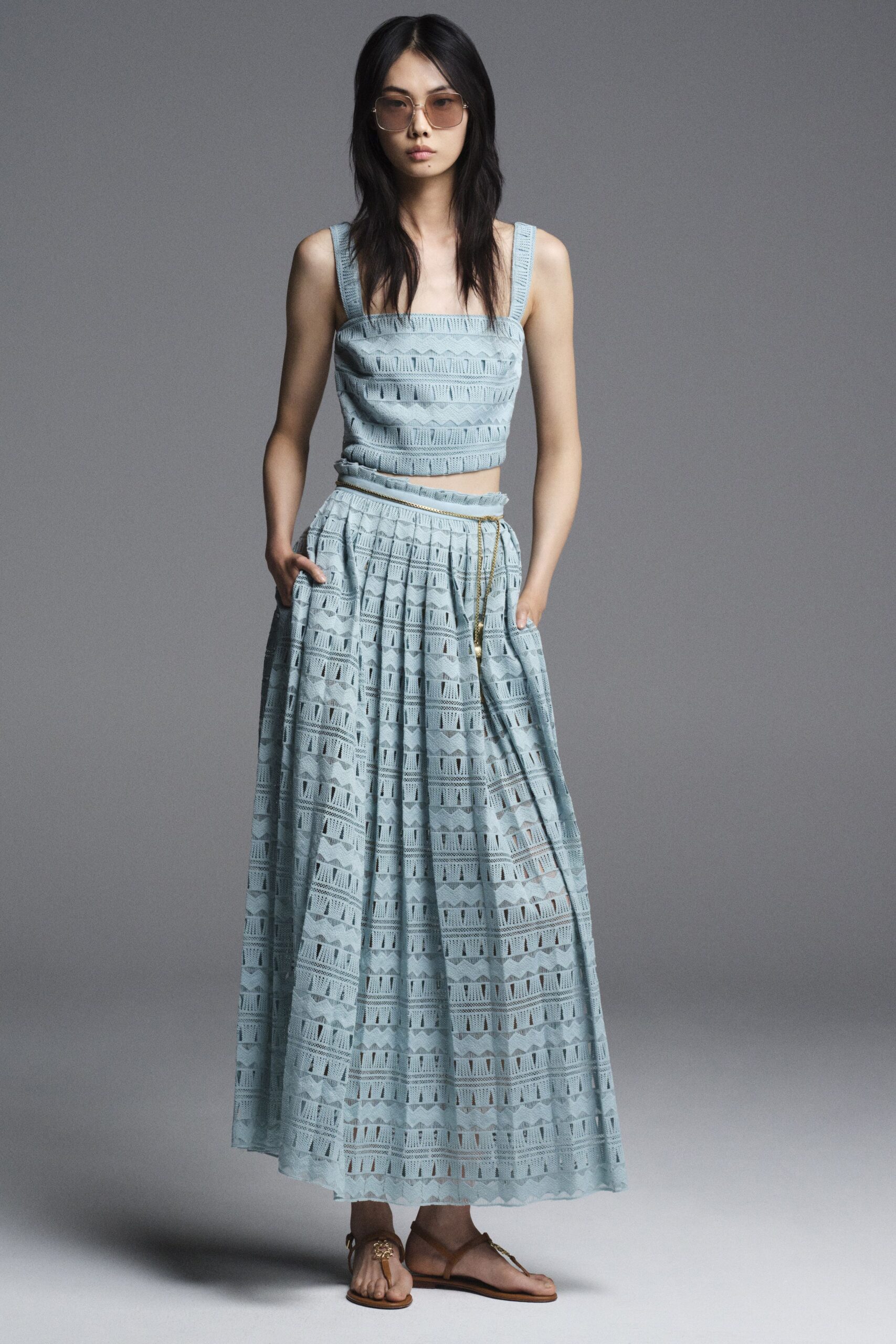 blue pleated top and skirt