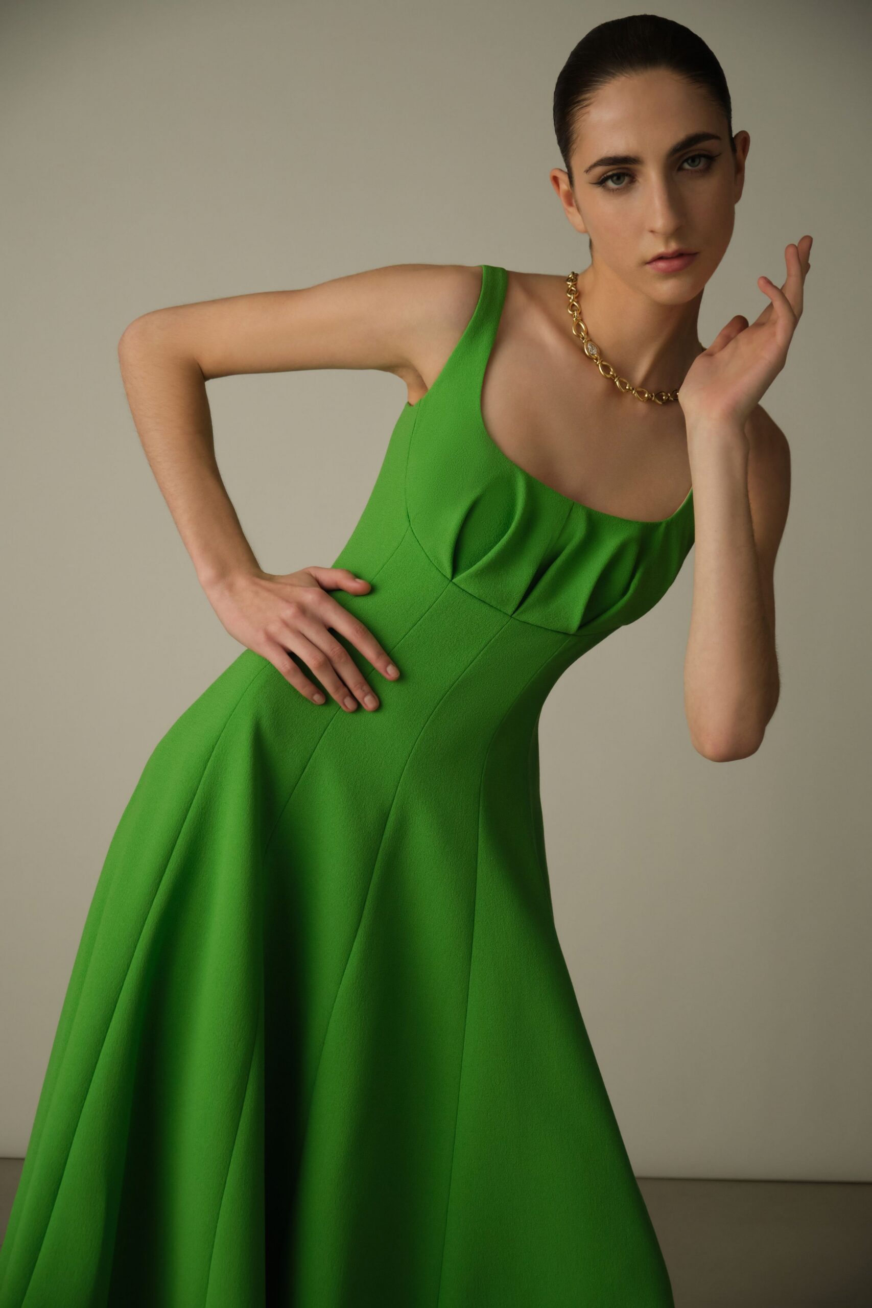 green fitted sleeveless dress