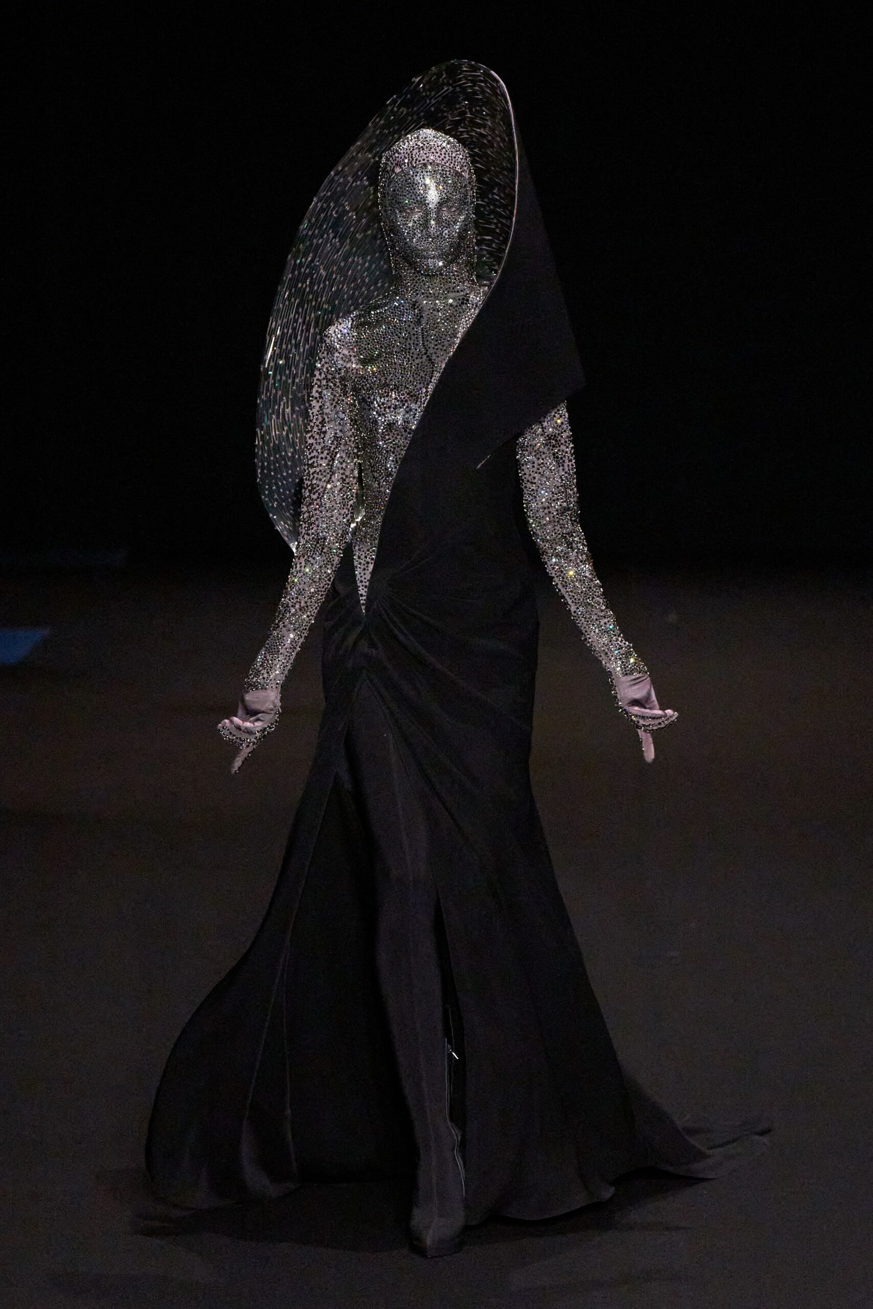 black silk fitted gown with headpiece