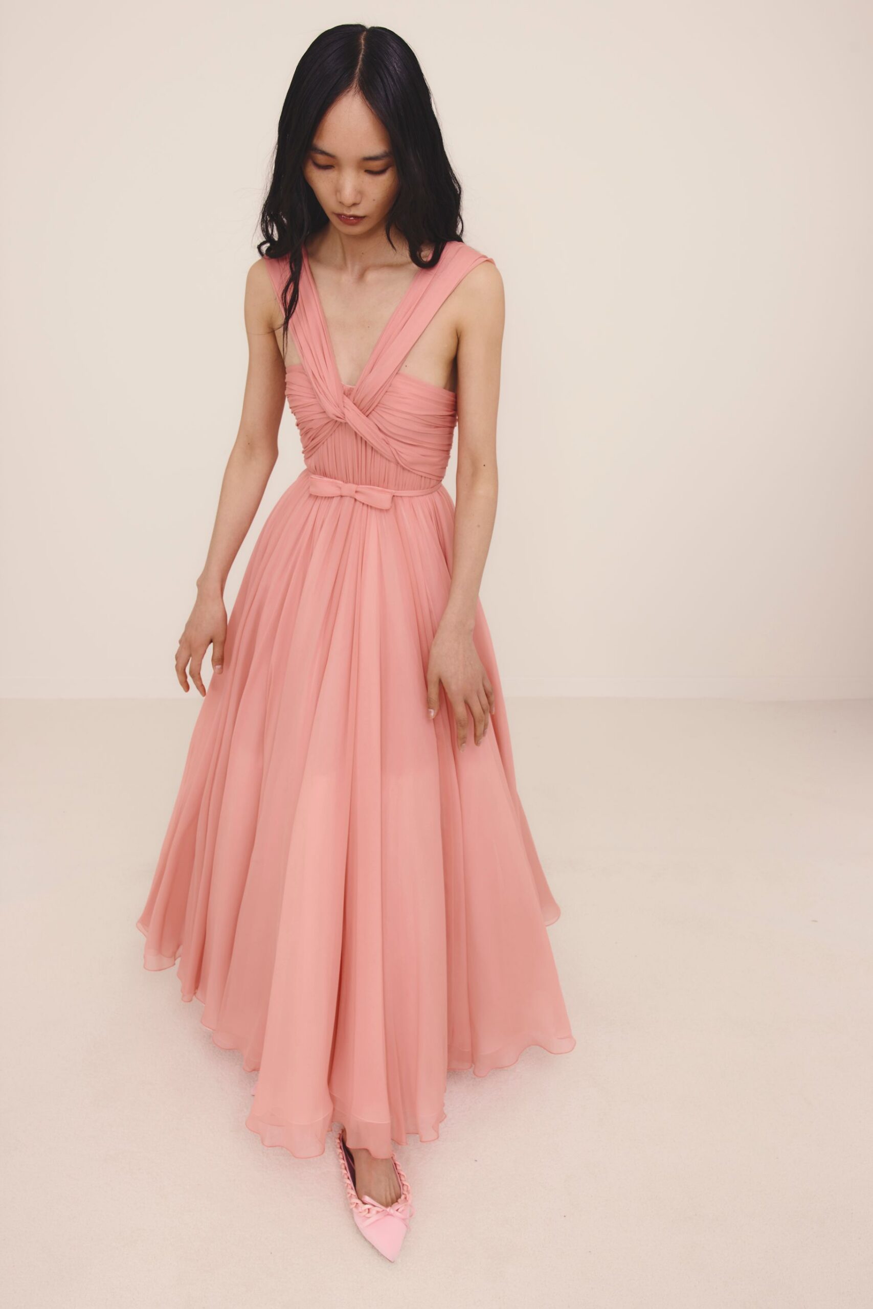 pink chiffon sleeveless v-neck fitted pleated draped gown