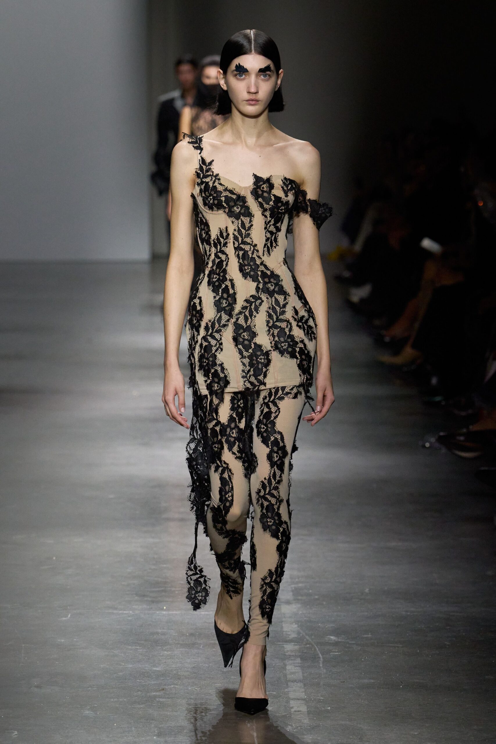 beige and black lace top and pants
