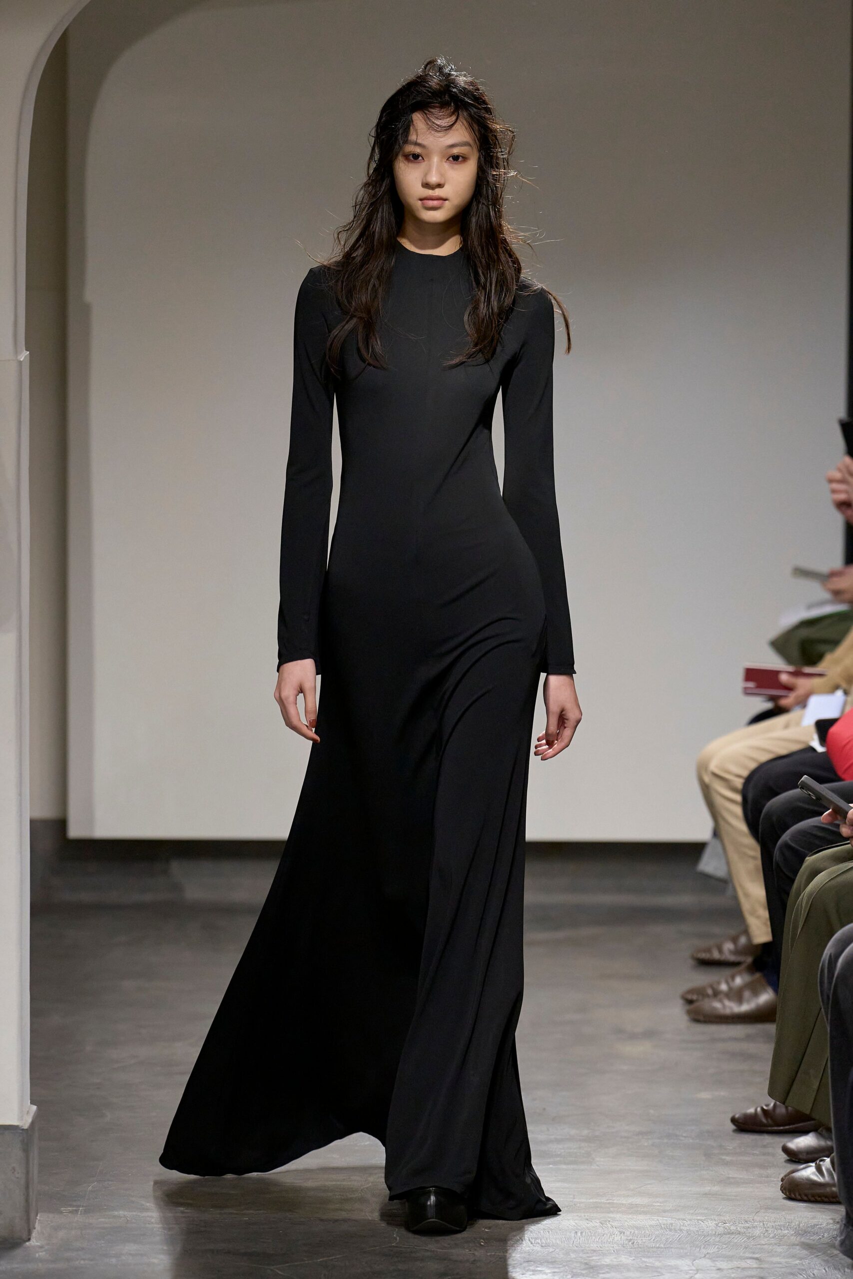 black jersey long-sleeve high-neck fitted flared flowing gown