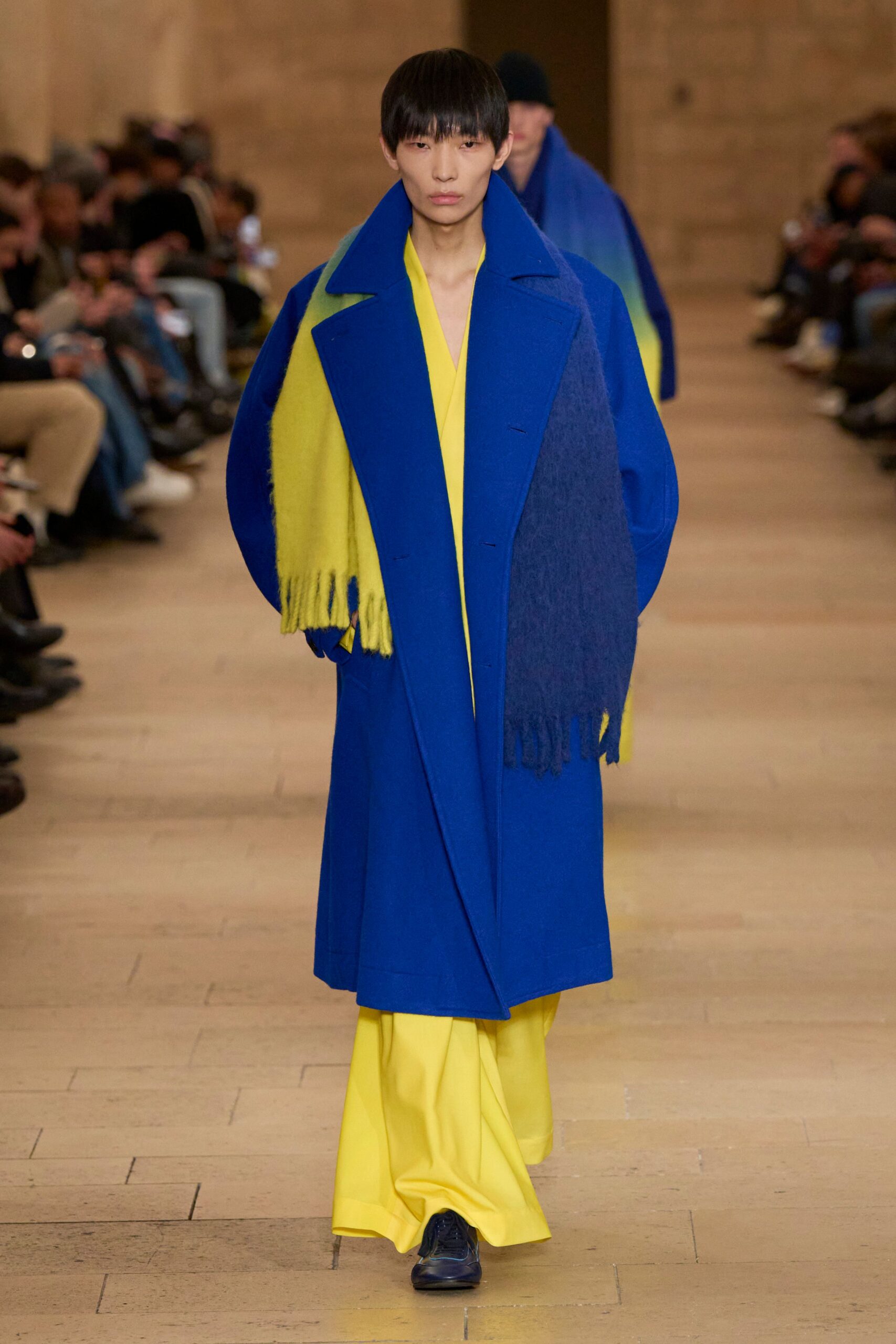 blue coat yellow dress