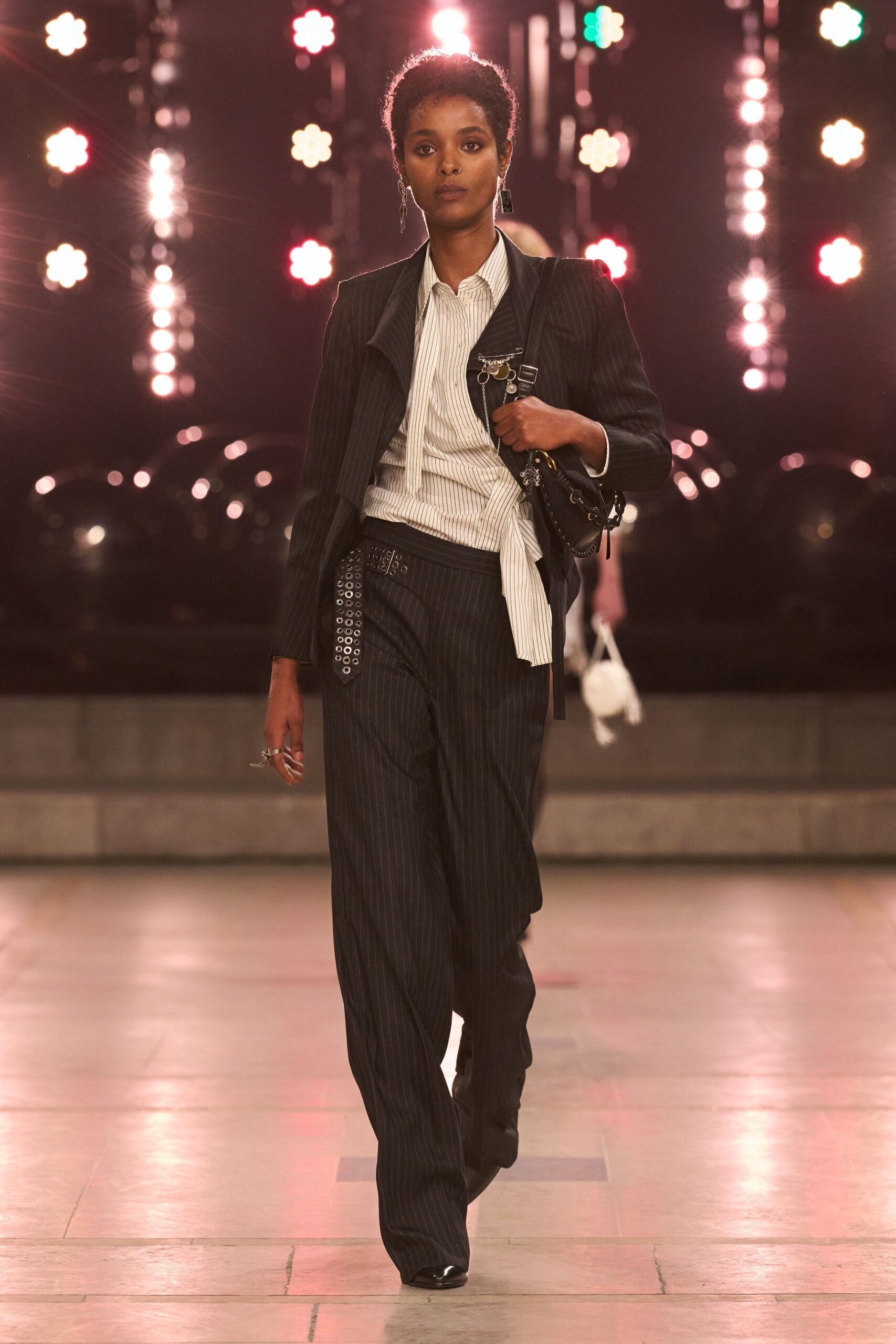 black tailored blazer with striped shirt