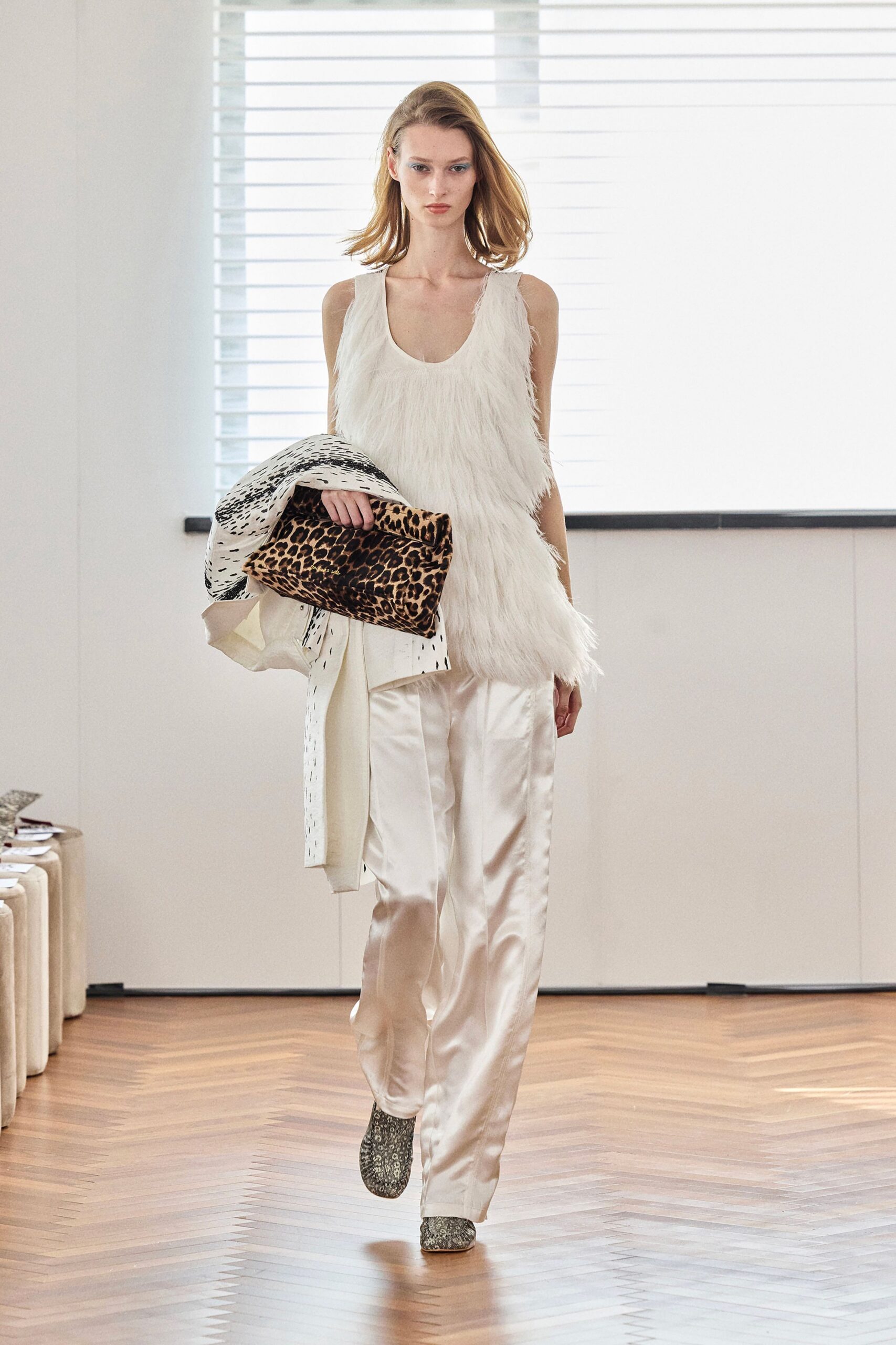 white cotton long-sleeve collared structured buttoned coat
