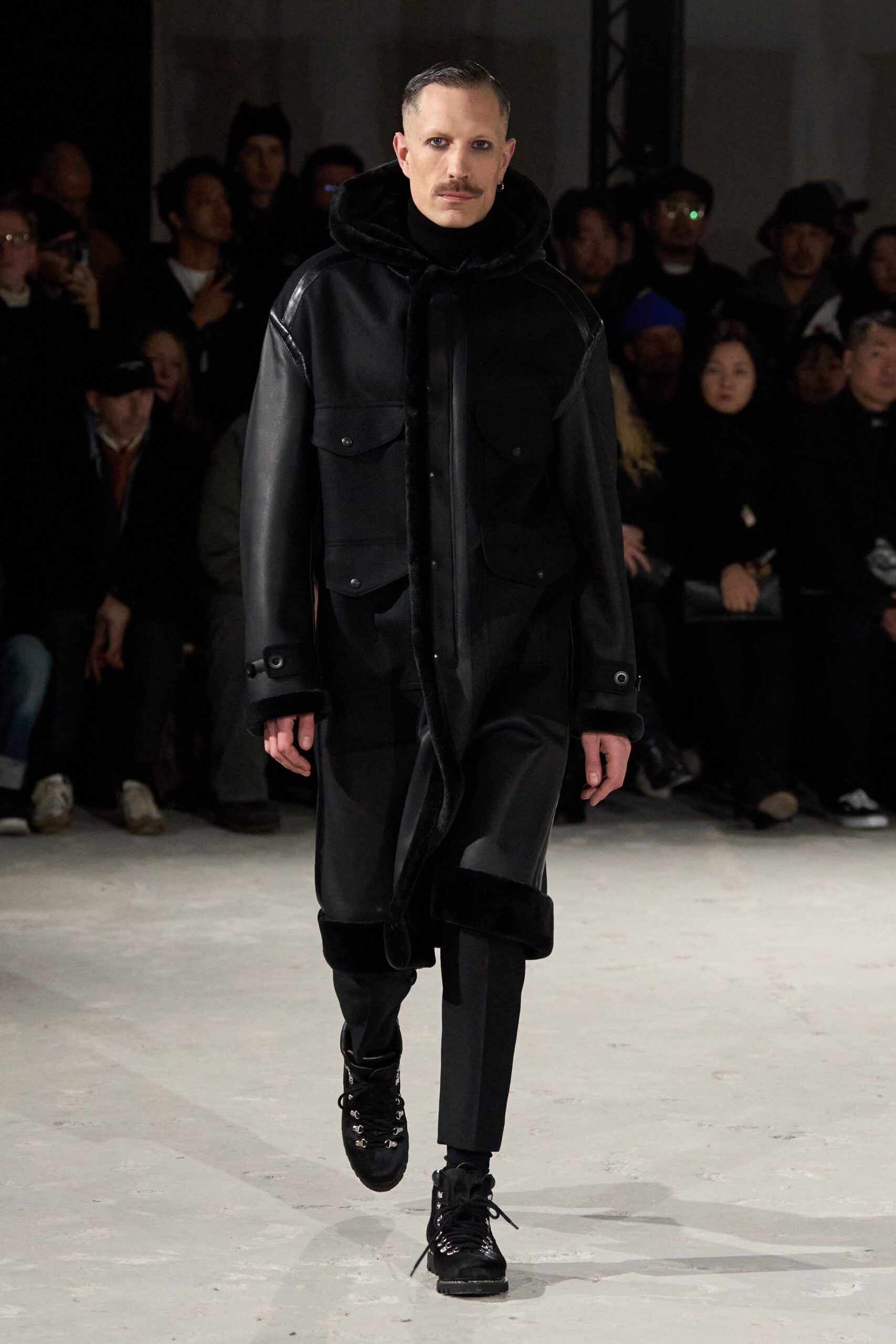 black leather coat with slim pants