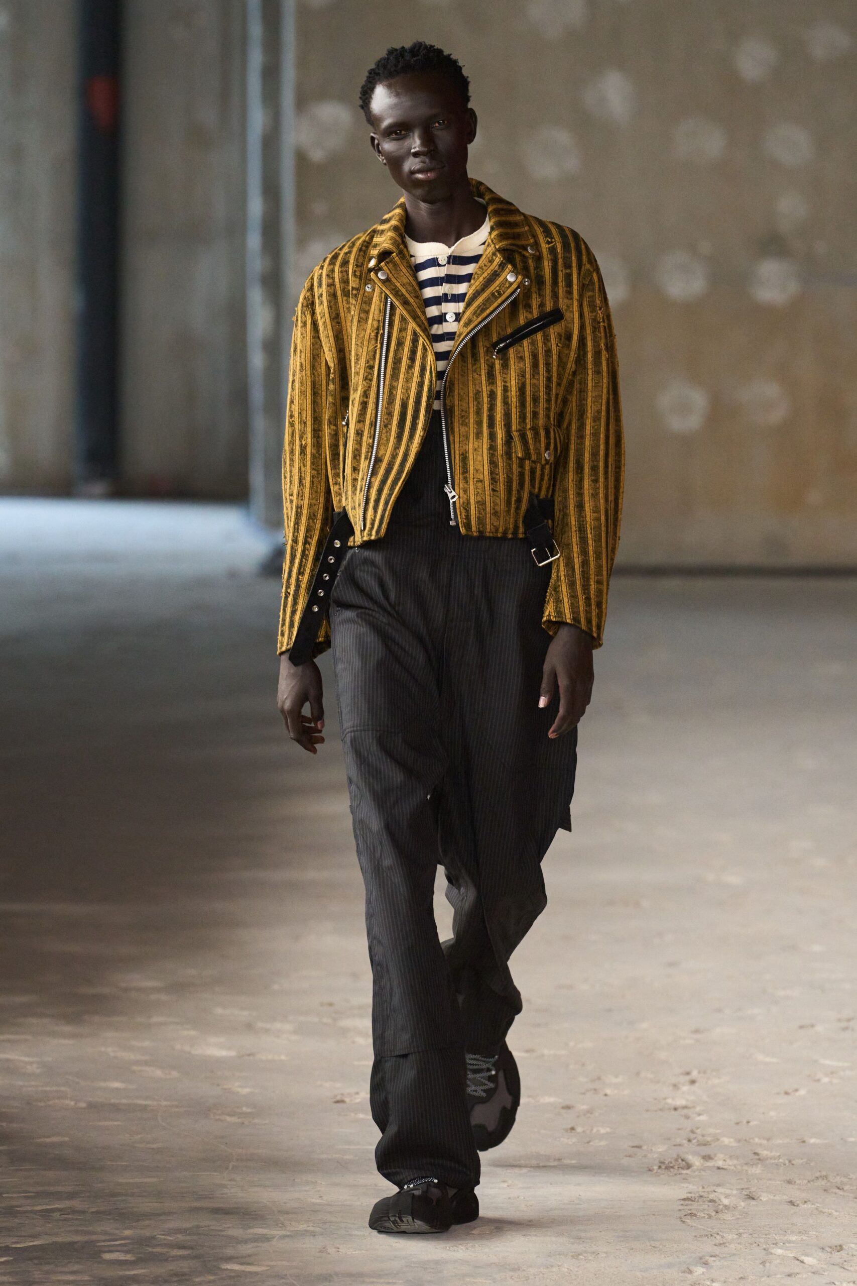 yellow striped jacket black pants