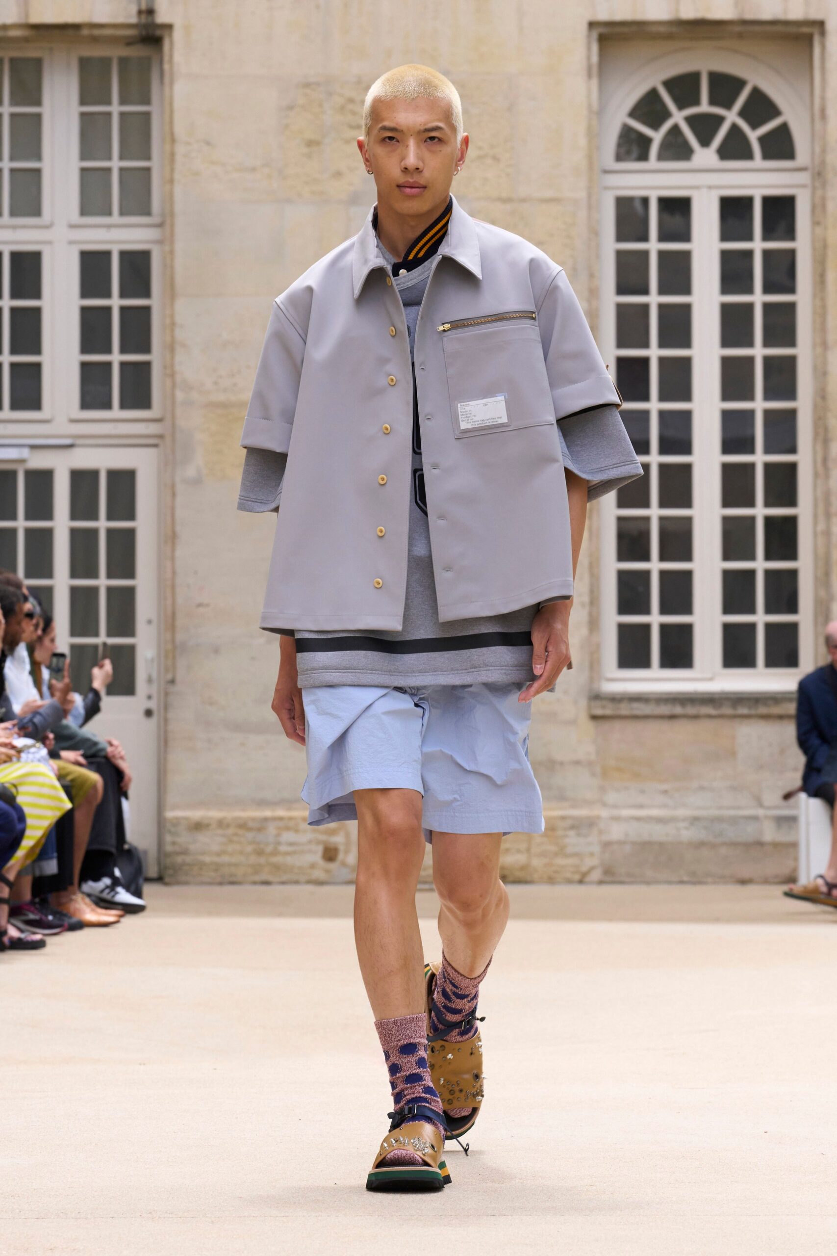 gray relaxed jacket with blue shorts