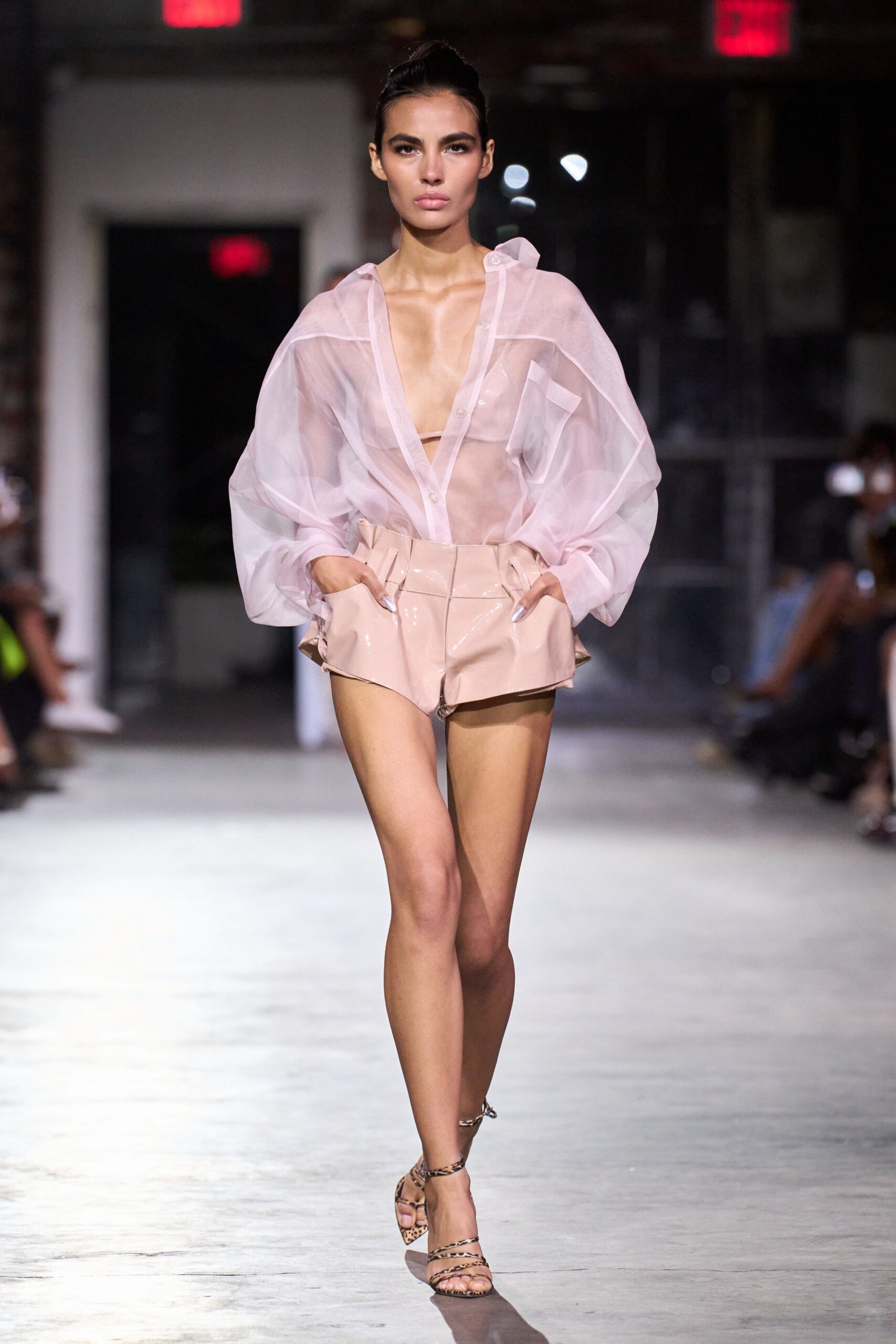 sheer pink top with vinyl shorts
