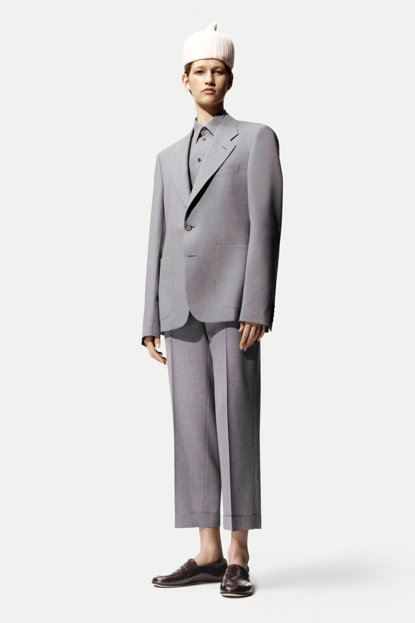 gray tailored suit with hat