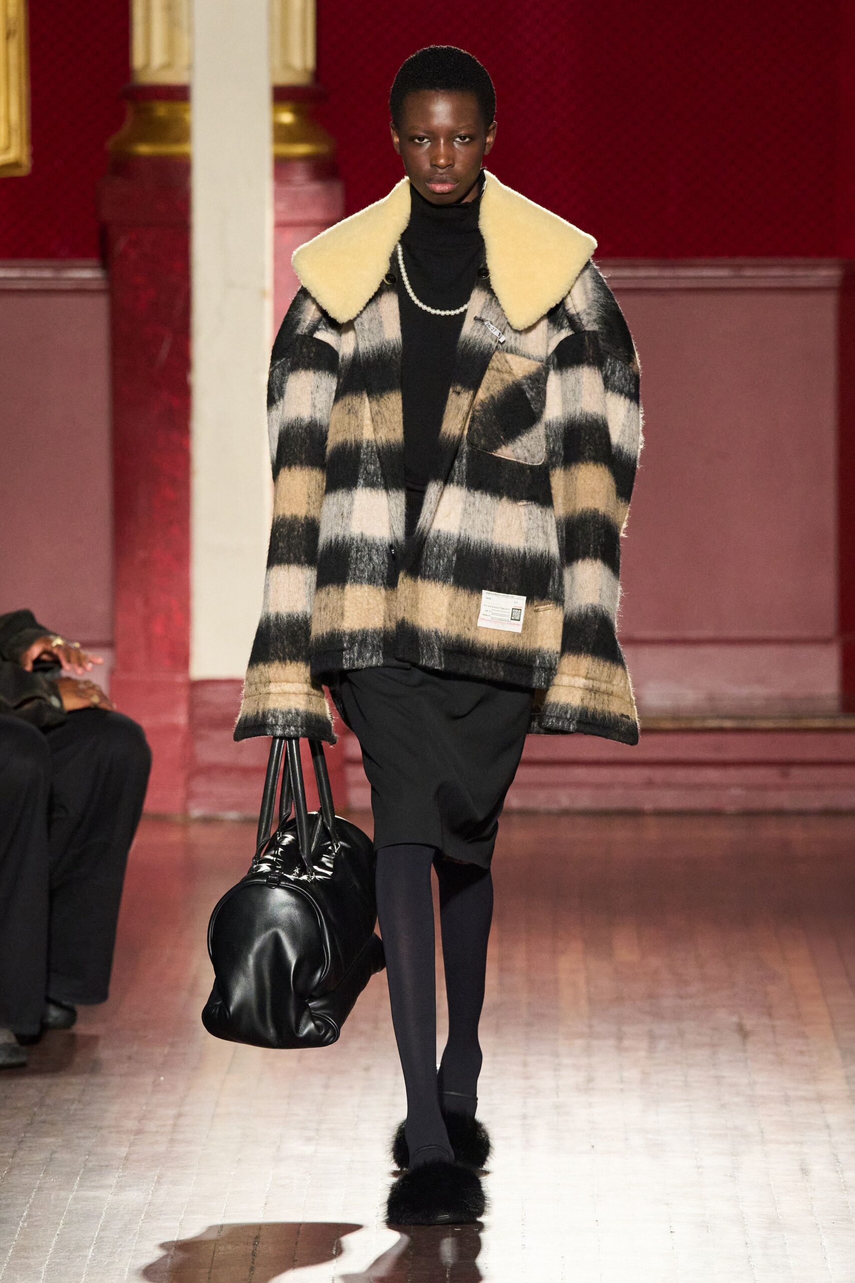 oversized checked coat with black turtleneck
