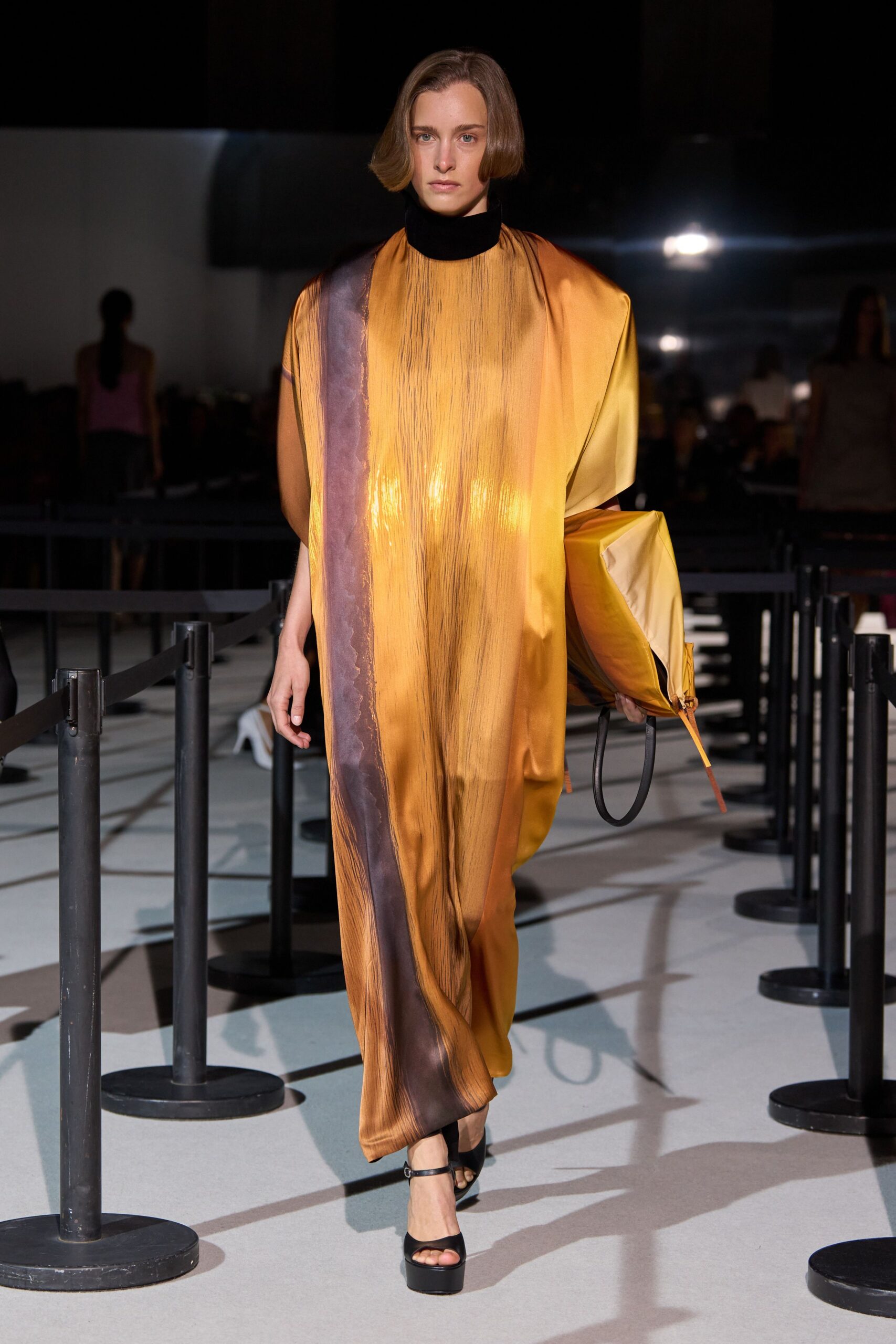 orange silk long-sleeve high-neck relaxed draped flowing gown