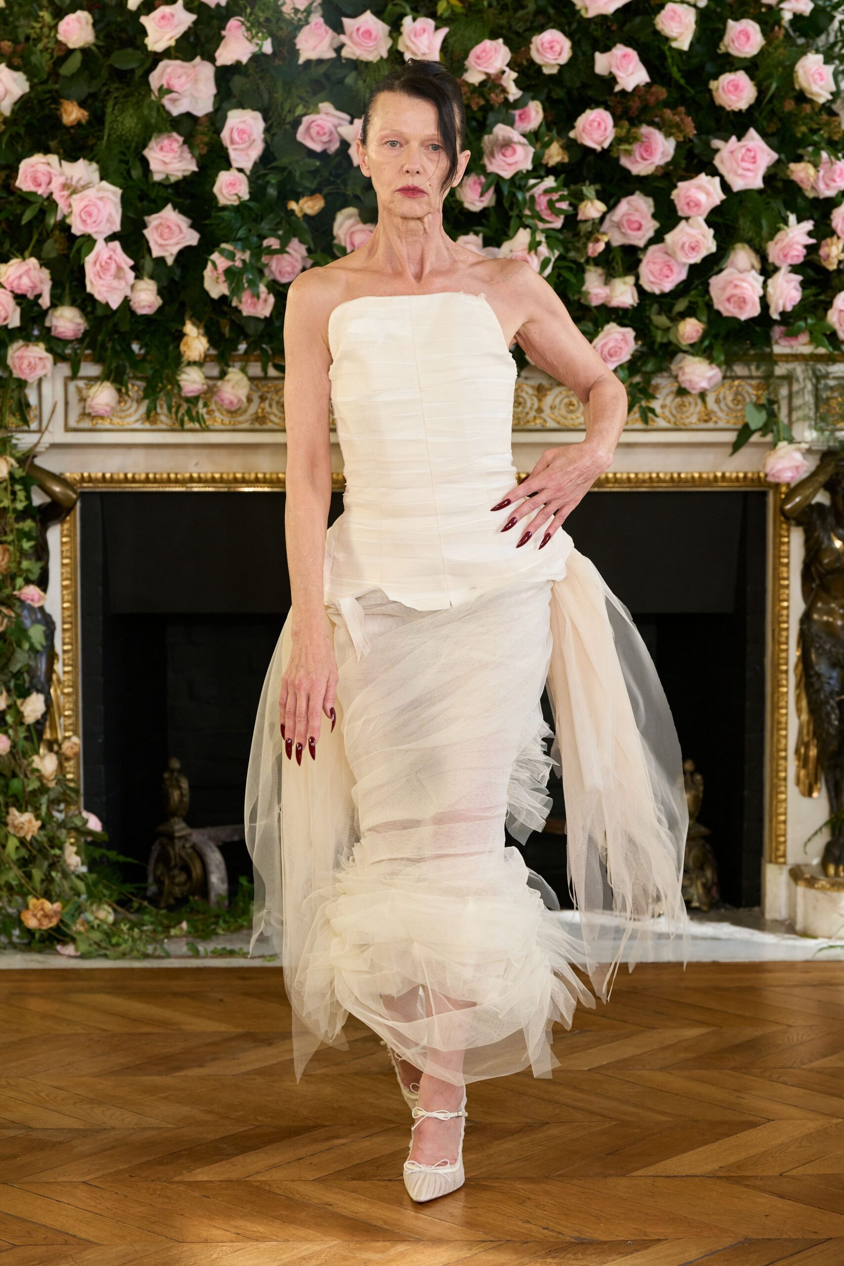 white silk strapless fitted pleated layered flowing gown