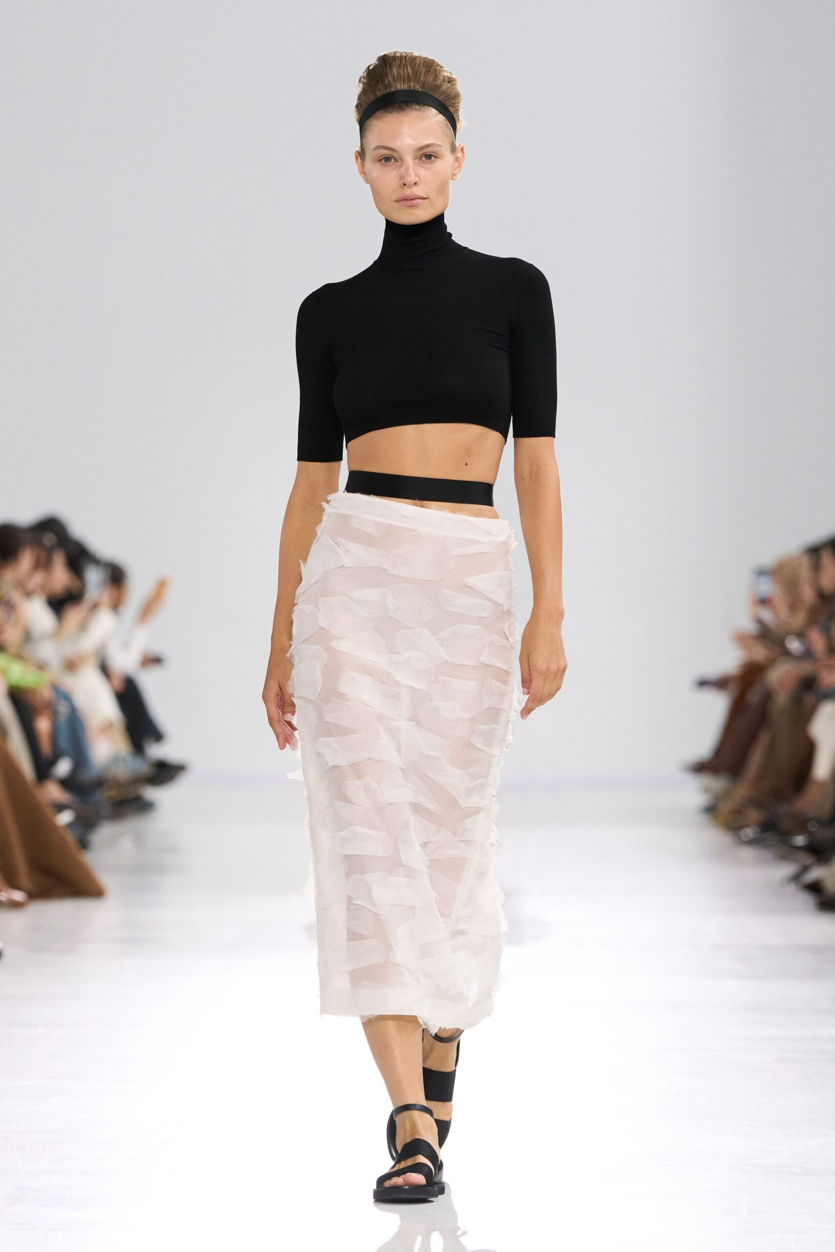 black cropped top white pleated skirt