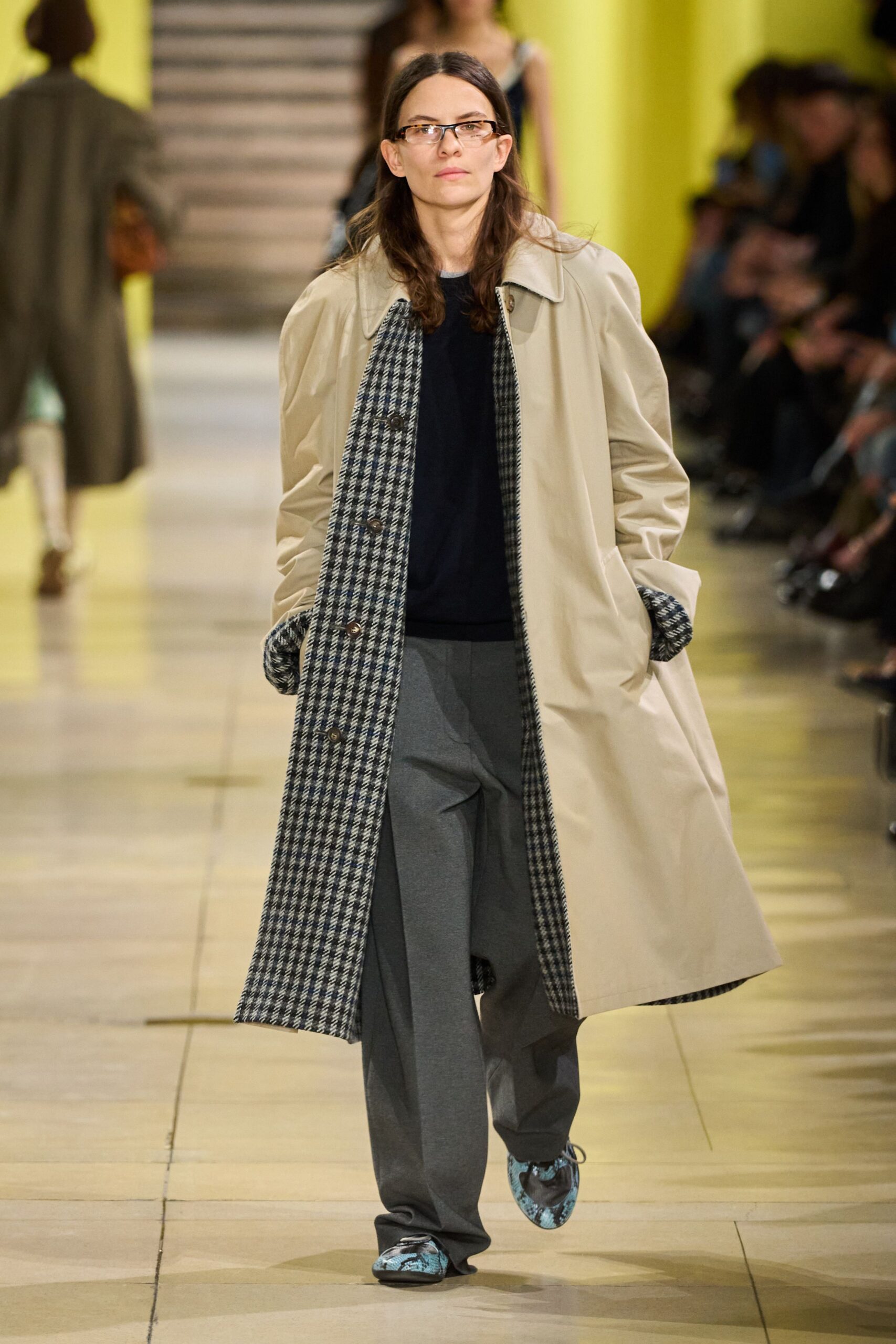 beige coat navy top gray pants blue shoes