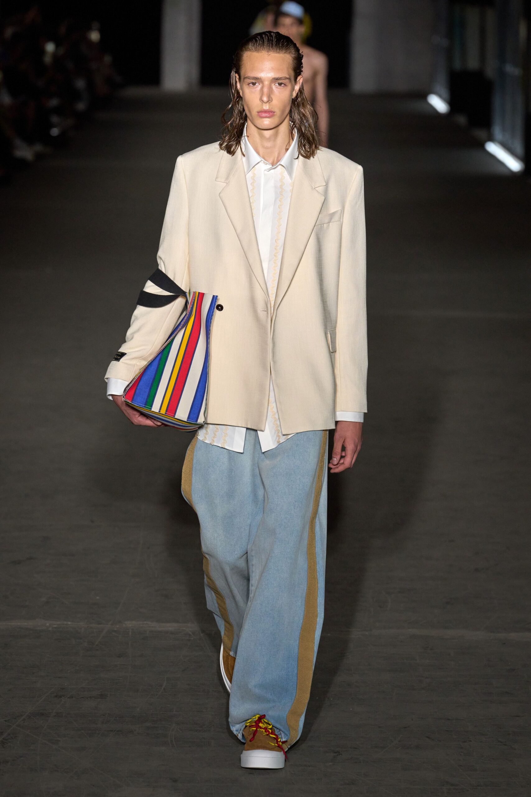 beige blazer white shirt blue pants