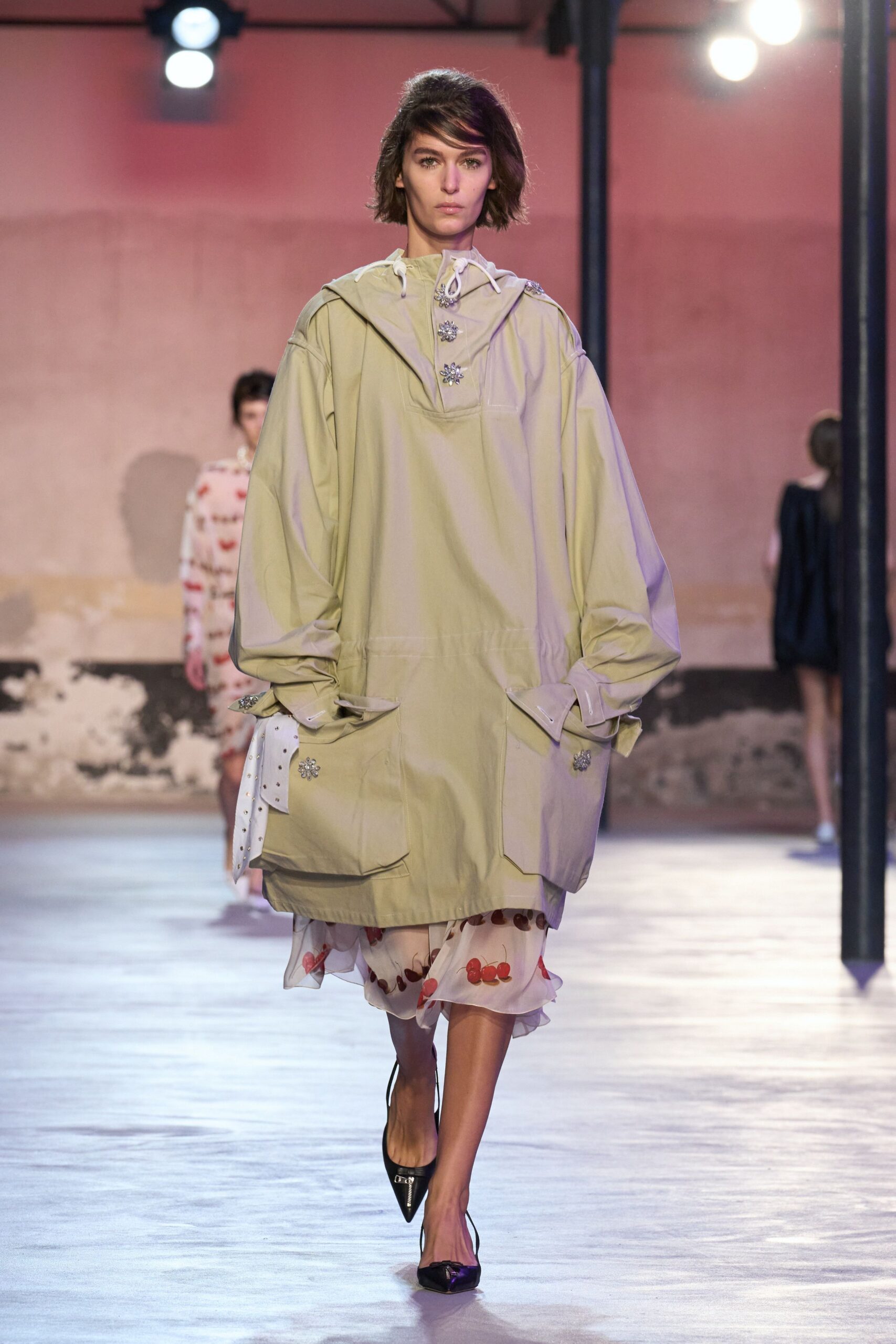 green oversized coat with floral dress