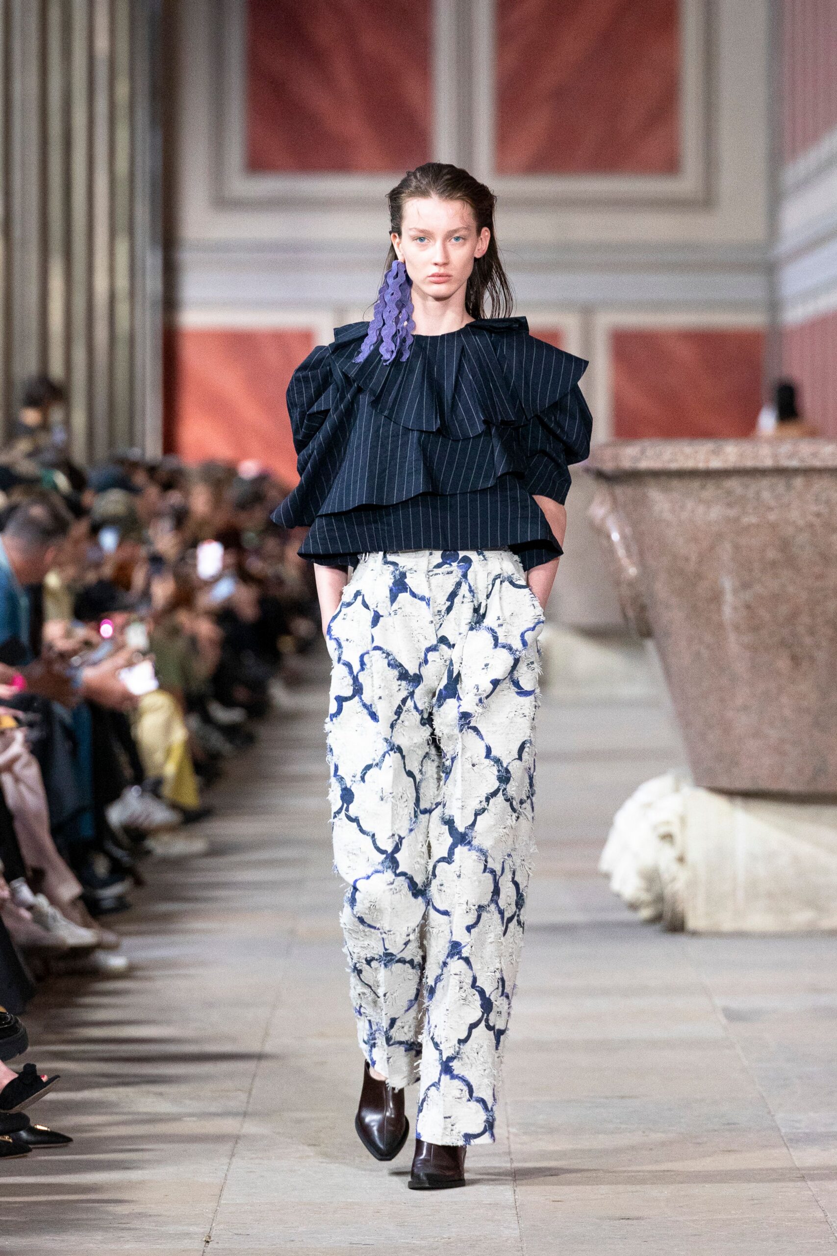 blue pleated top with relaxed pants