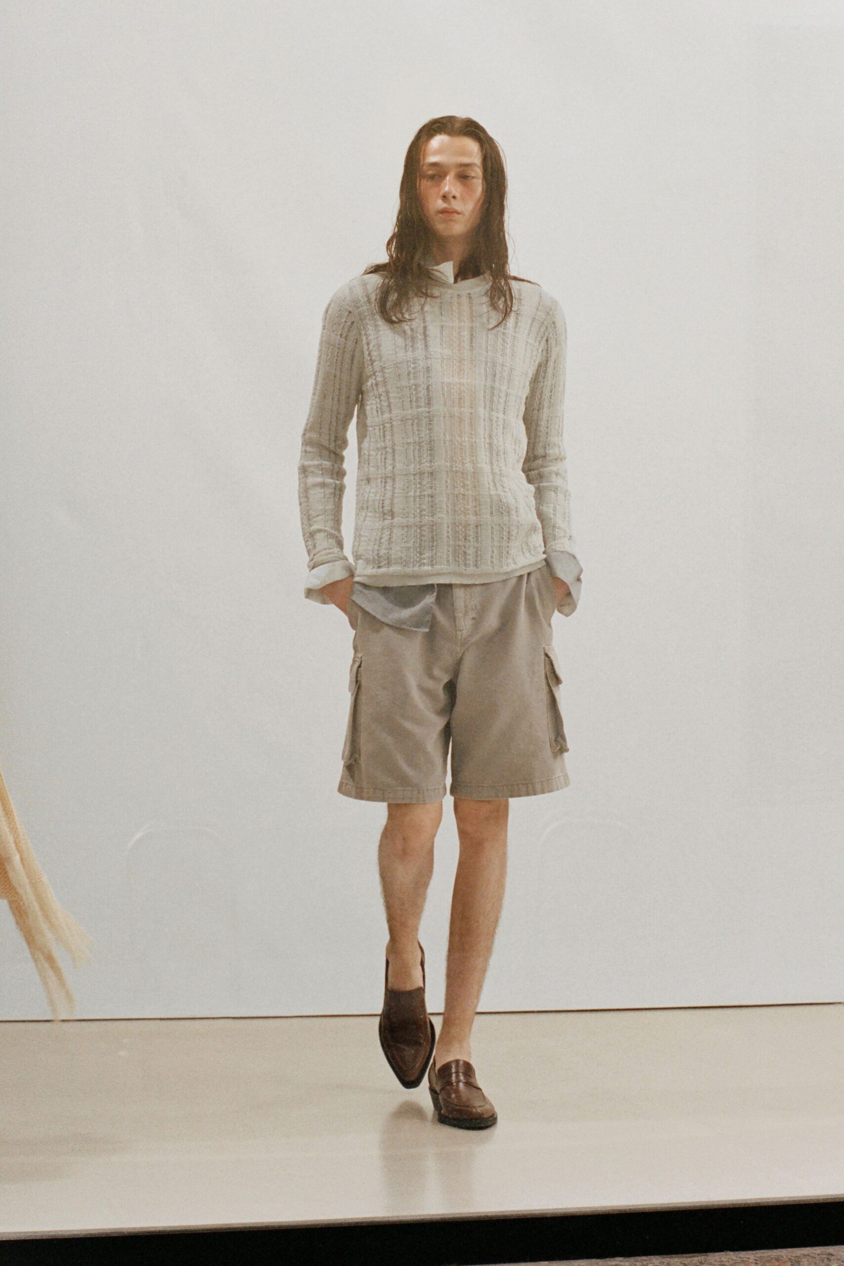 white relaxed hoodie with beige cargo shorts