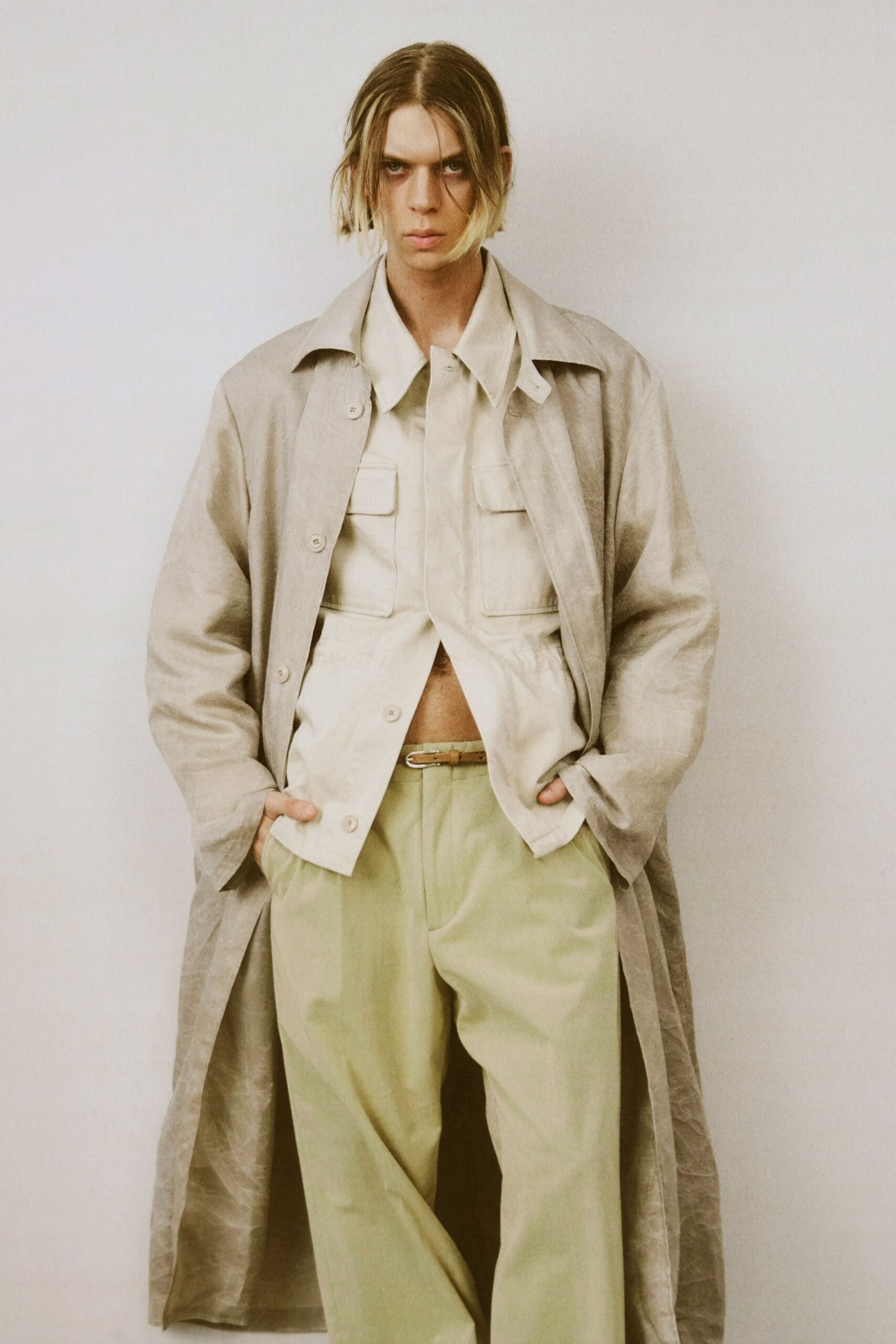 beige linen coat with green pants