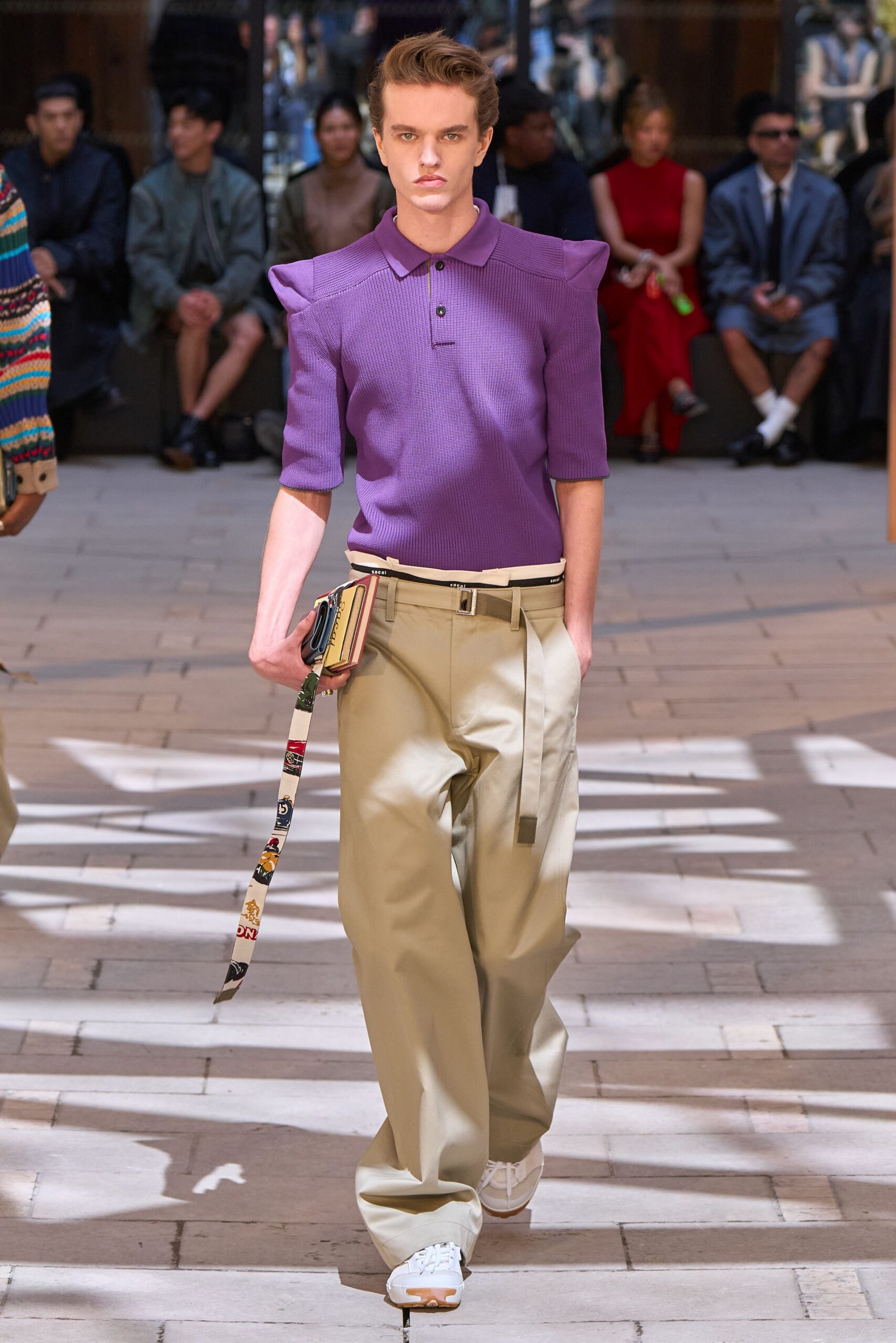 purple collared shirt with beige pants