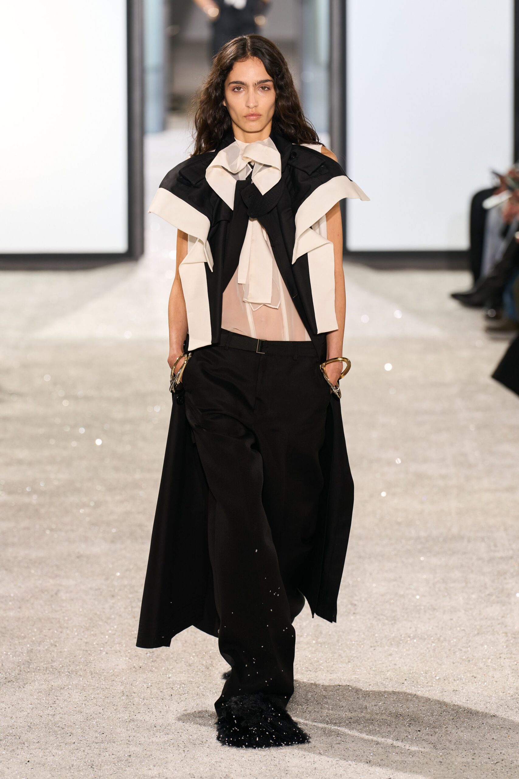 black and white layered top with pants