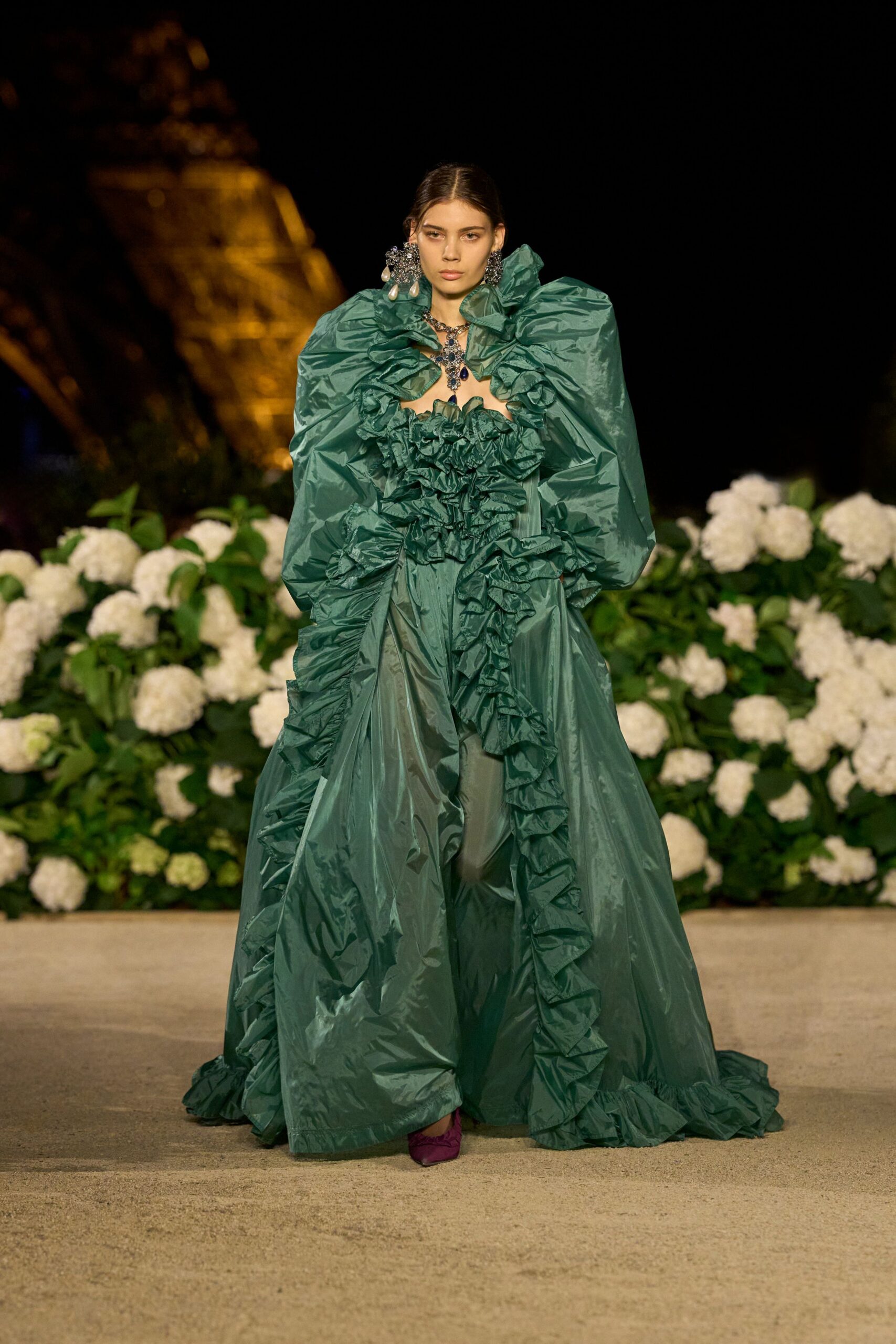 green silk long-sleeve off-shoulder fitted ruffled layered gown