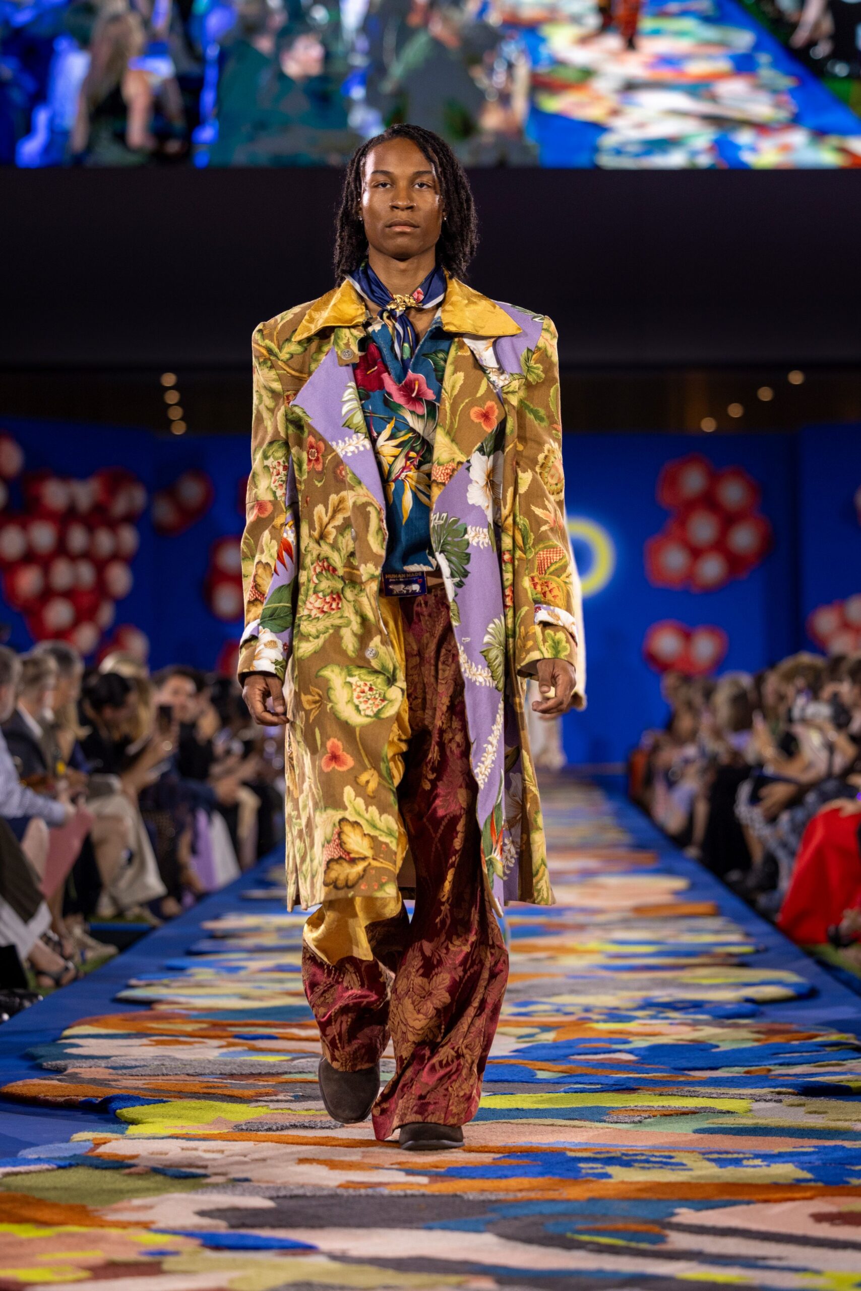 multi-colored floral coat with silk shirt