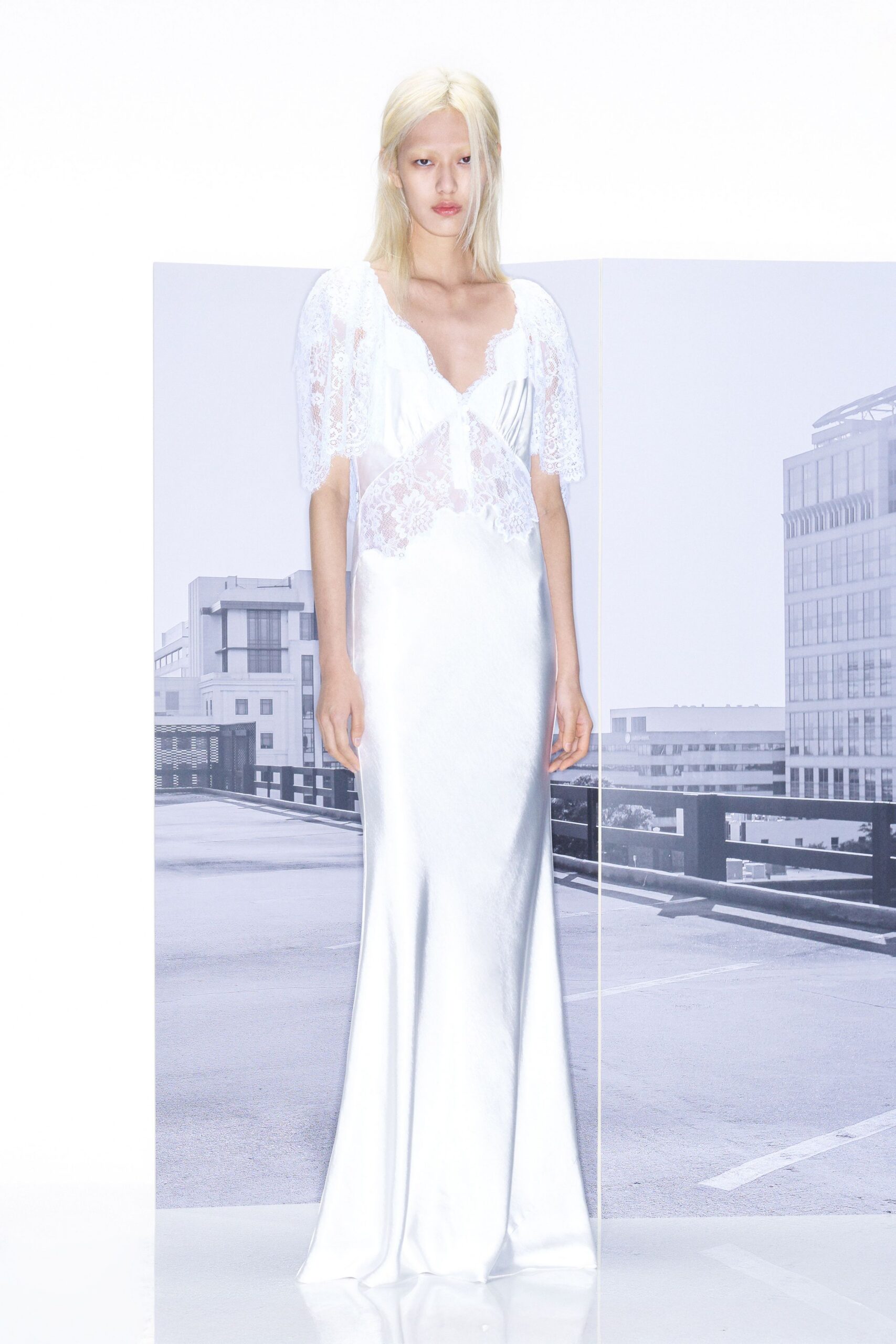 white silk sleeveless gown