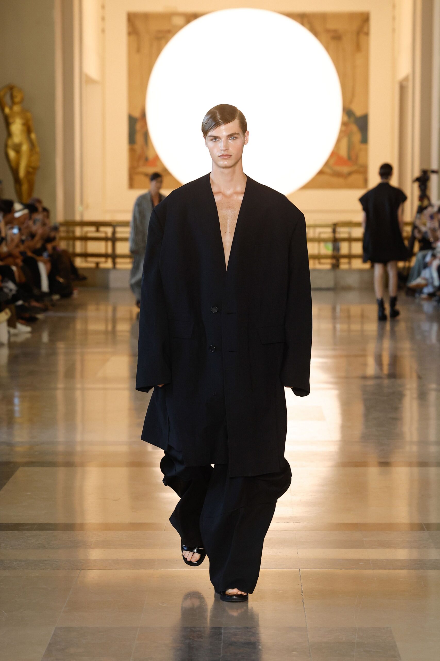 black oversized coat with relaxed pants