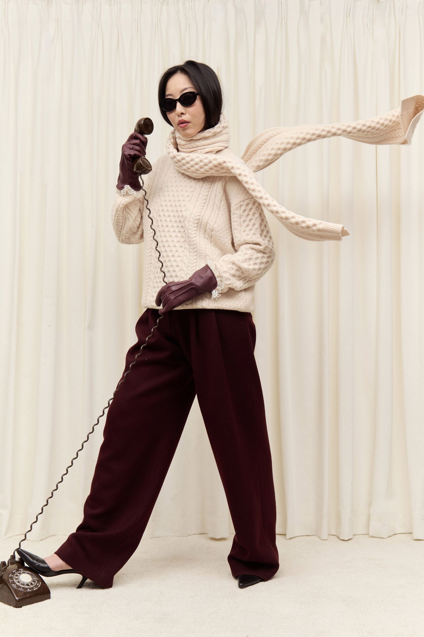 beige wool sweater maroon pants