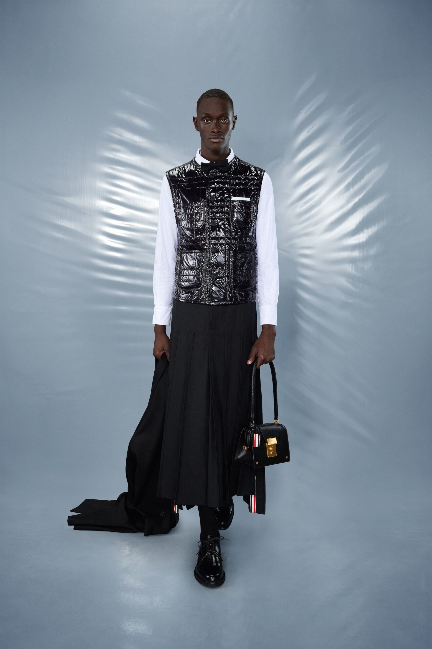 black vinyl sleeveless collared fitted zippered shiny vest
