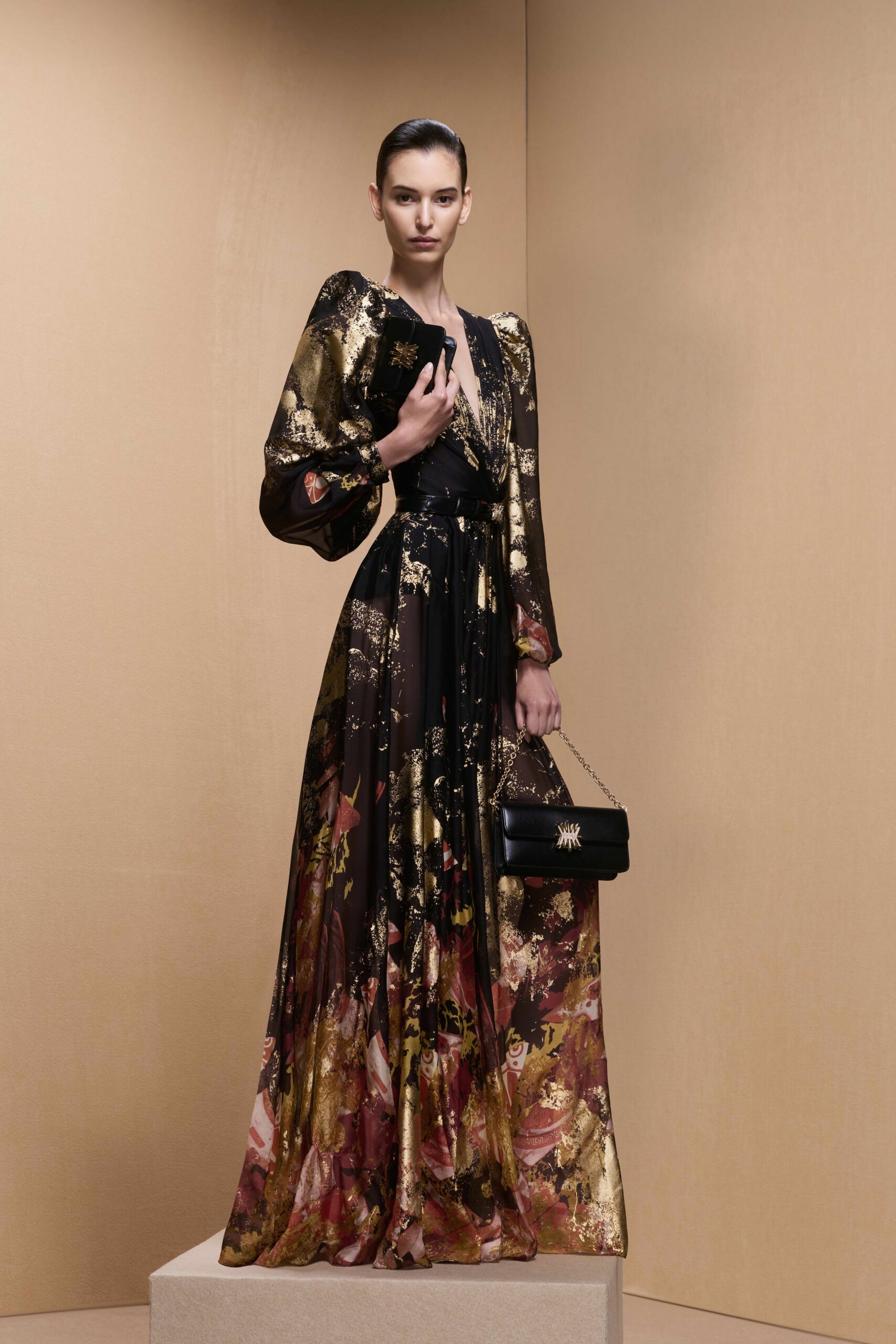 black silk long-sleeve v-neck fitted flared printed gown