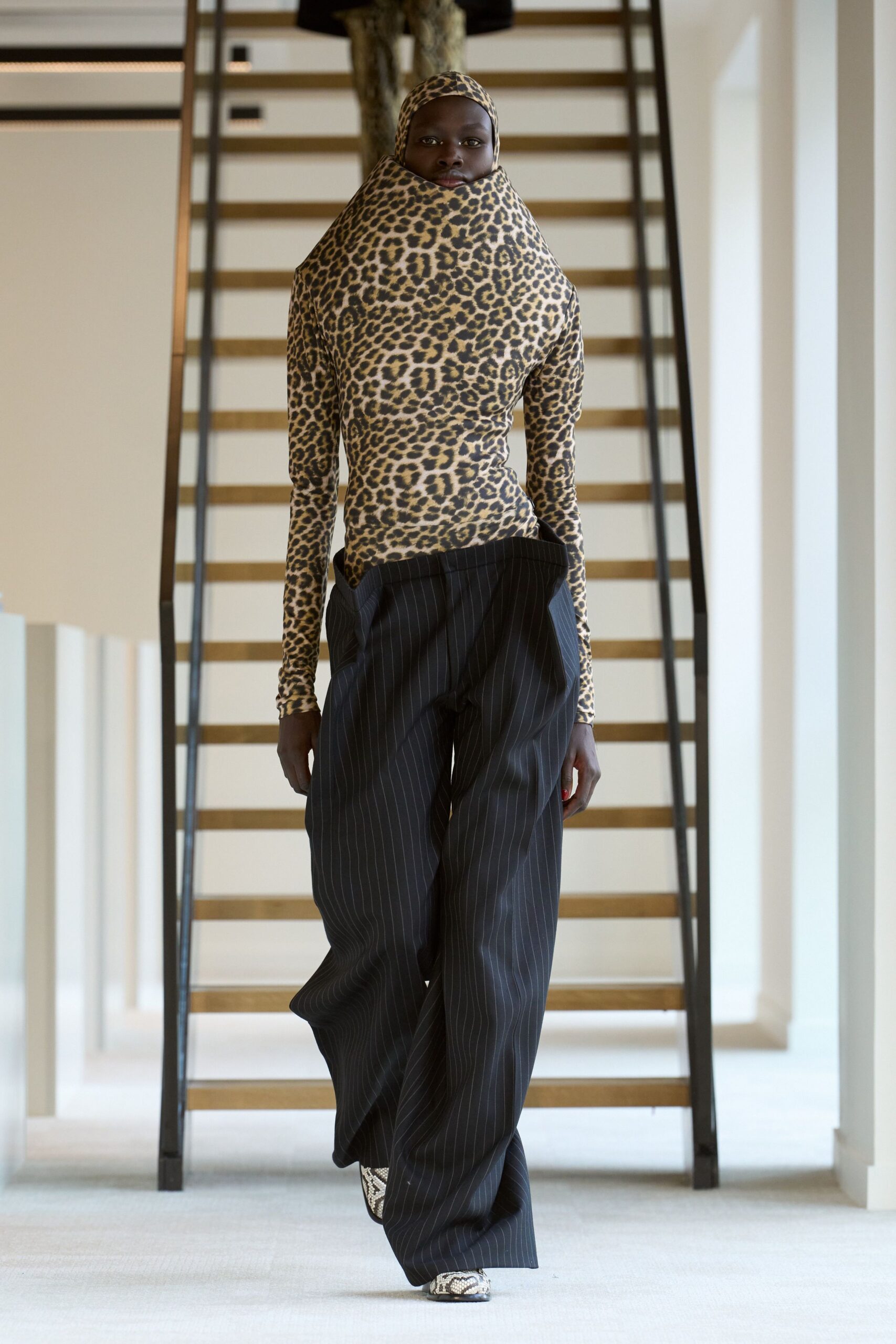 brown cotton long-sleeve high-neck fitted animal-print top