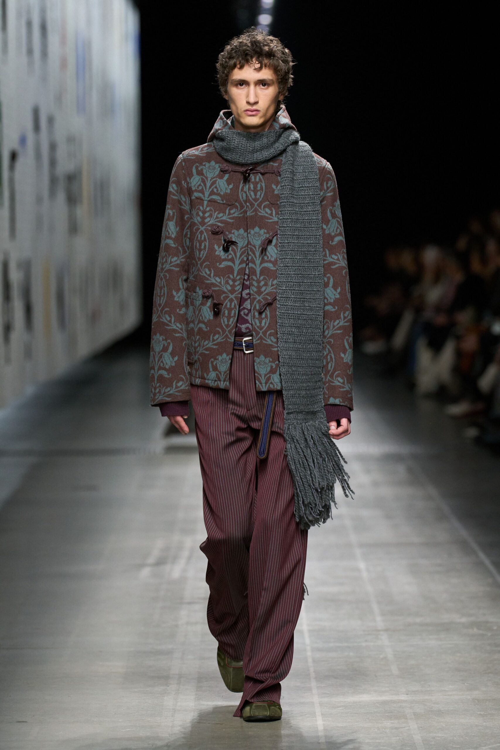 embroidered brown jacket with striped pants