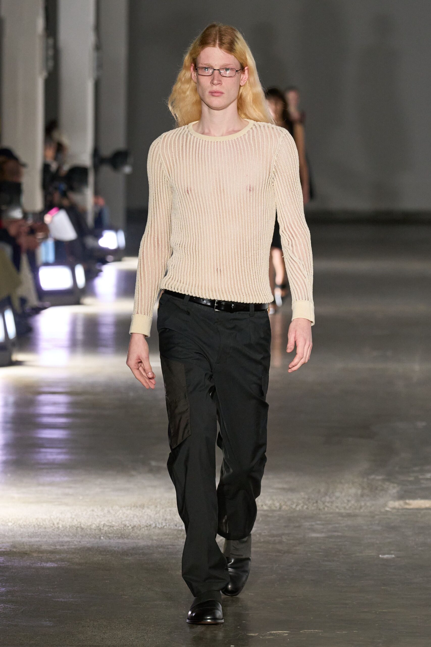 beige ribbed long-sleeve top with black pants