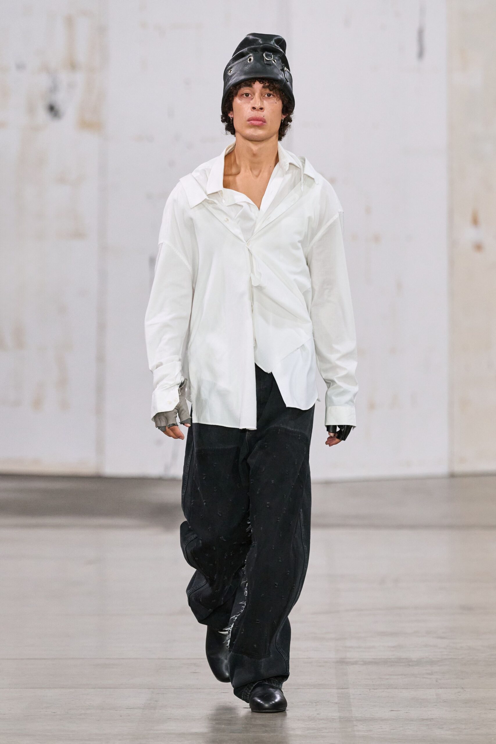 white relaxed shirt with black pants