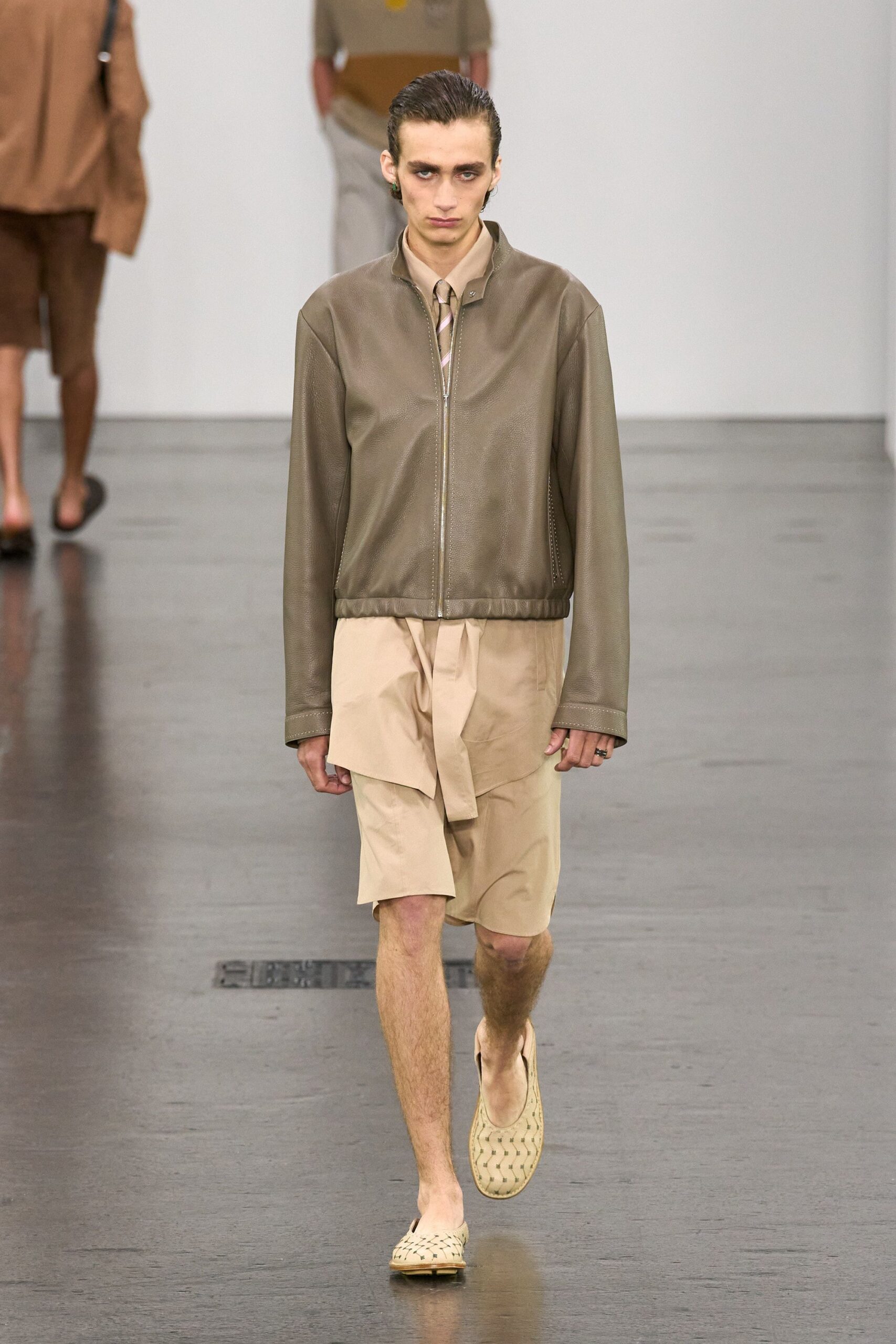 brown leather jacket beige shorts