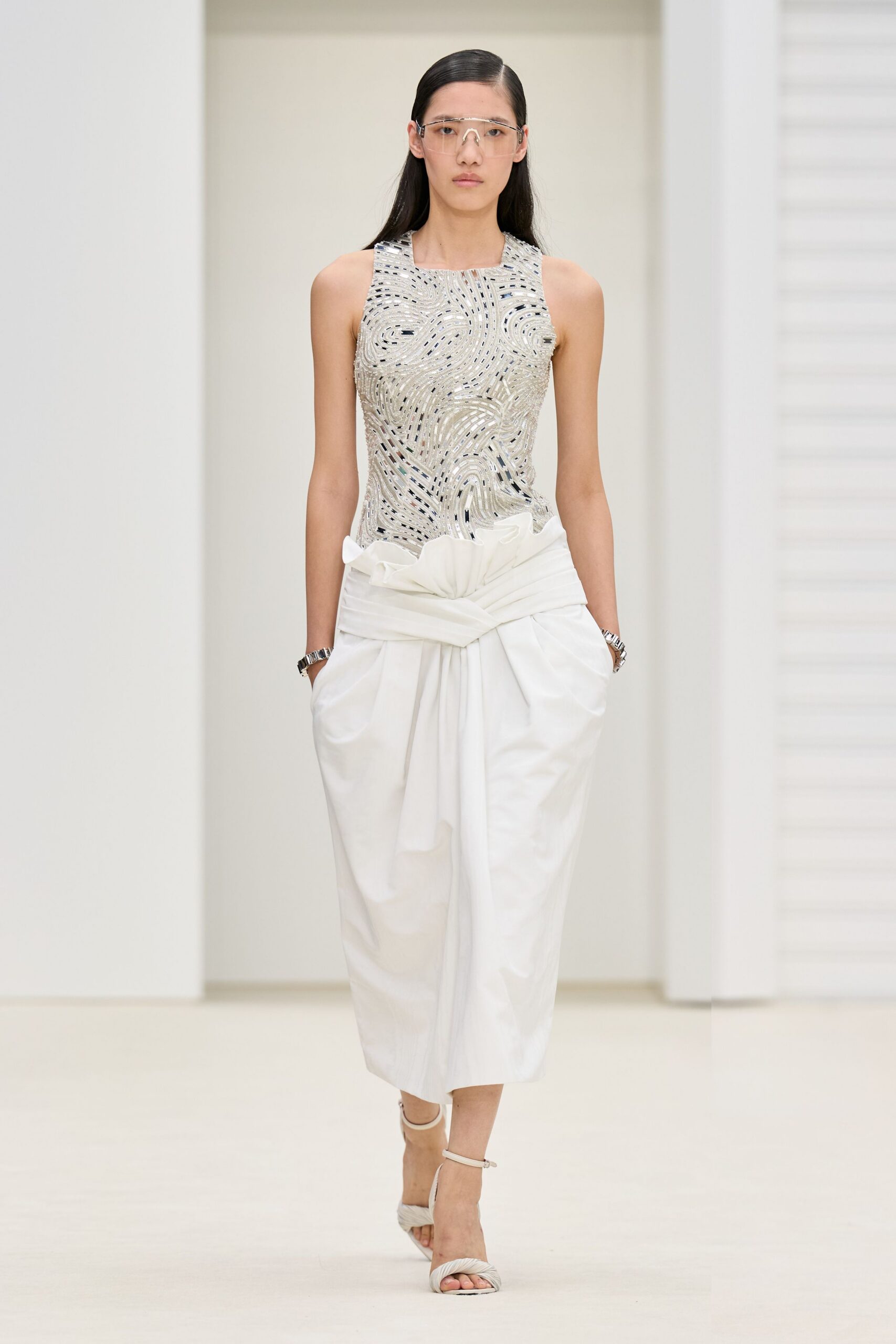 white silk sleeveless high-neck fitted embroidered top