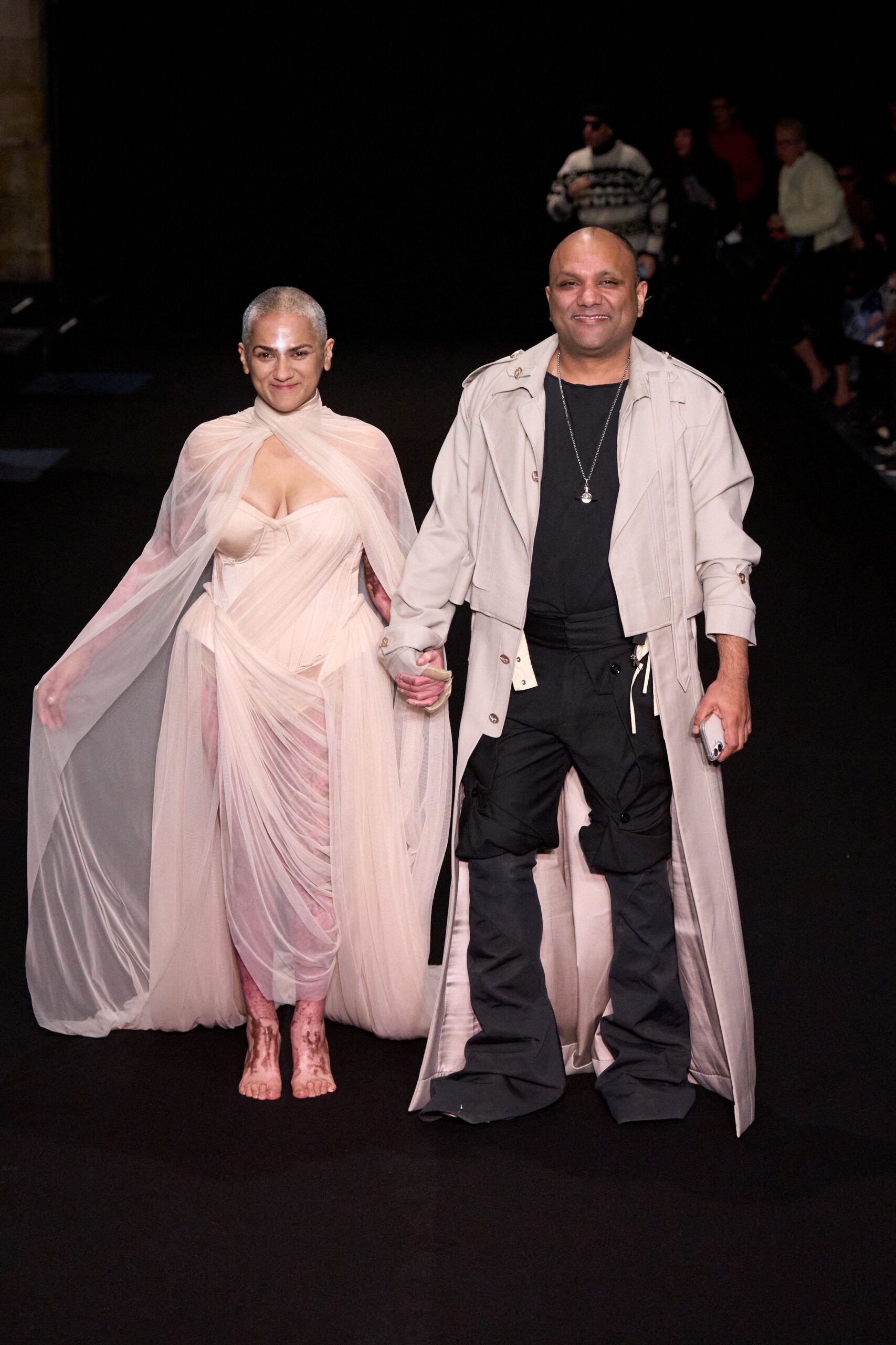 pink chiffon gown and beige coat