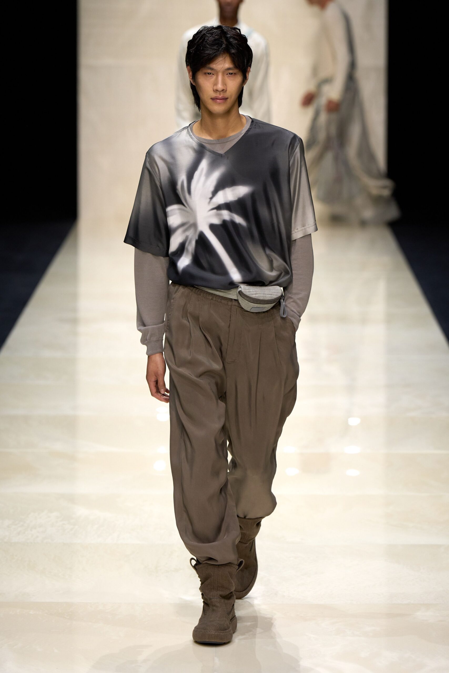gray printed t-shirt with beige pants