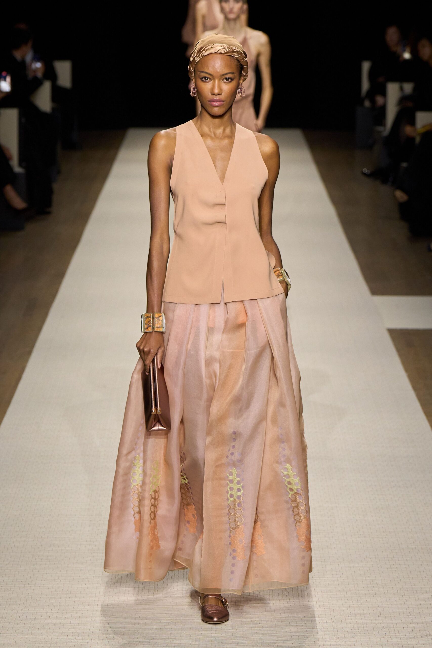beige silk top with pink skirt