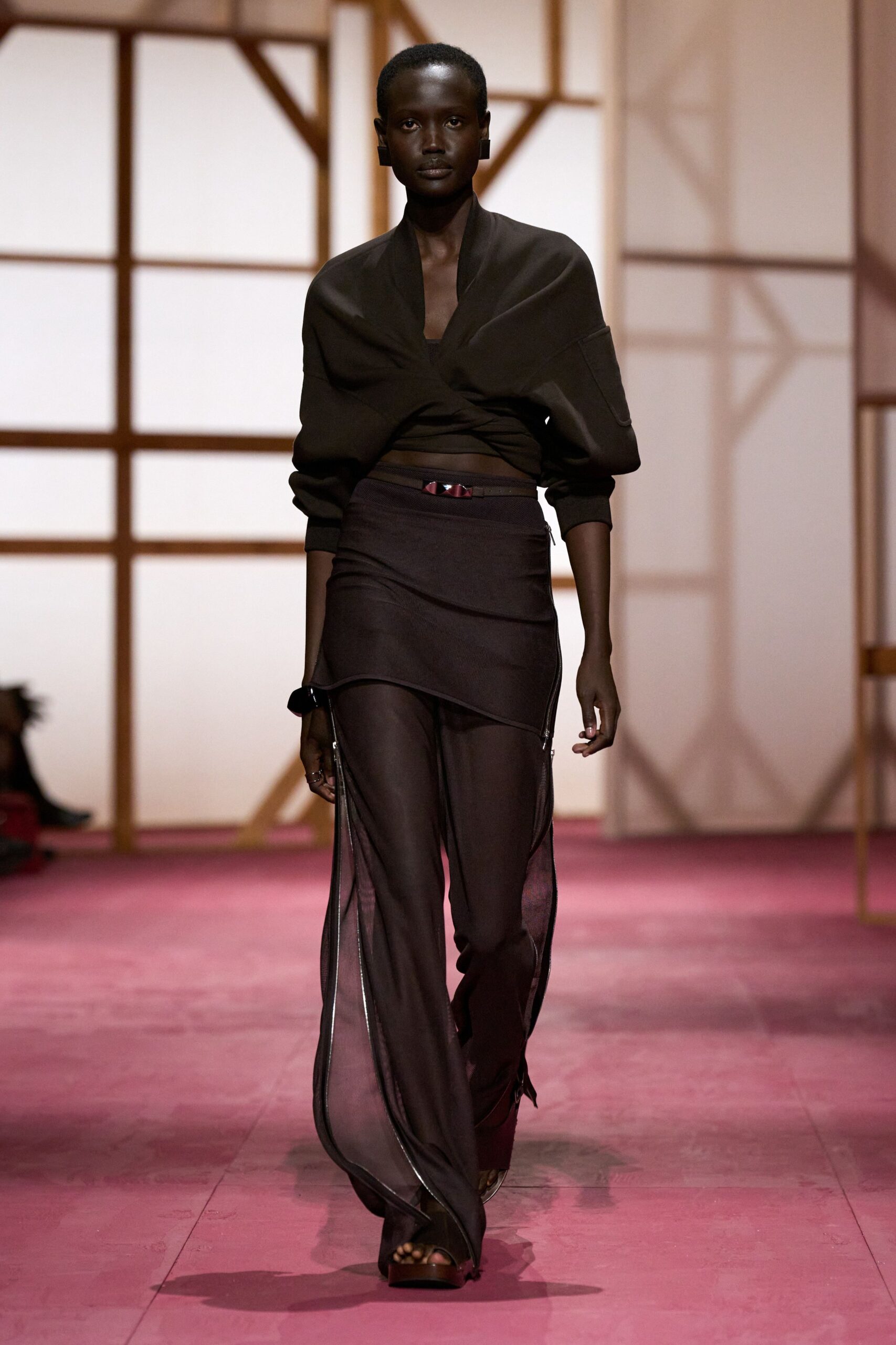 brown relaxed top and fitted pants